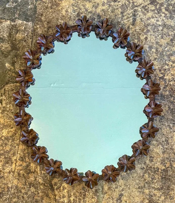 Marigold-interiors-forged-iron-flower mirror-oval.jpg