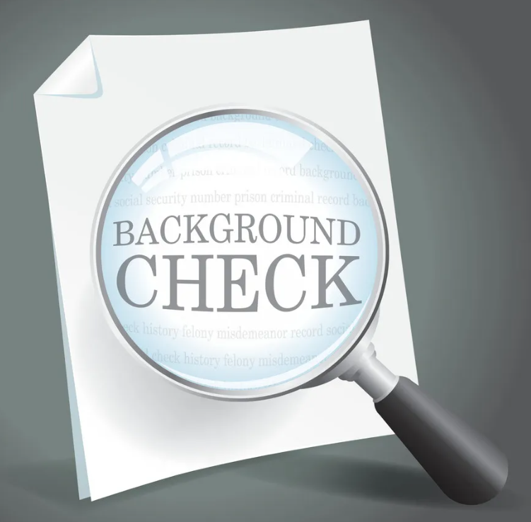 A close-up of a document with the words "BACKGROUND CHECK" under a magnifying glass.