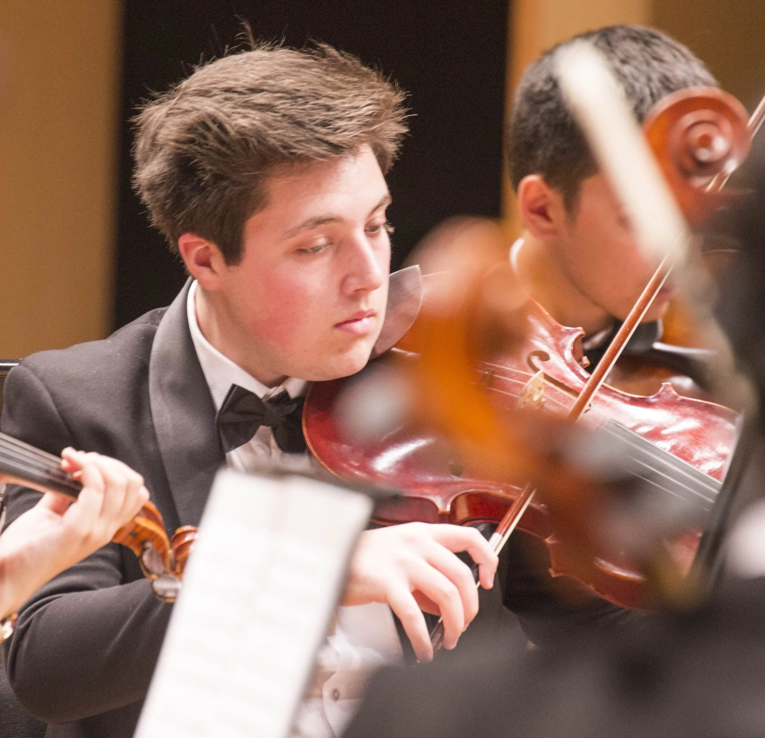 Kyle playing viola in orchestra