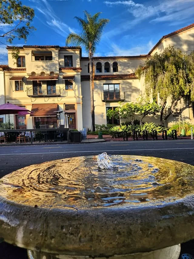 Catching glimmers of Golden Hour in a fountain downtown