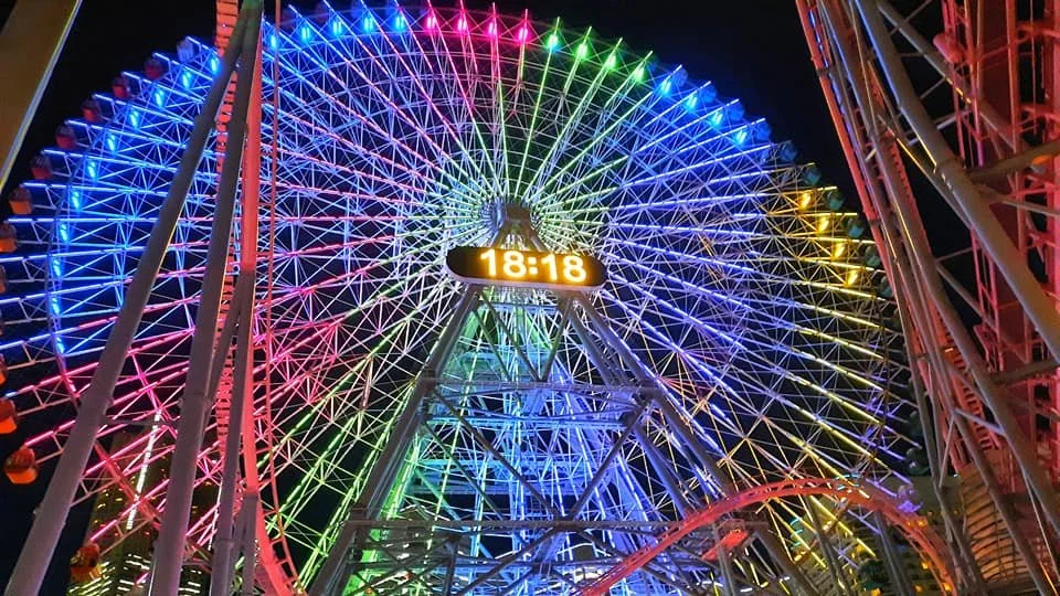 The Cosmo Clock 21 ferris wheel awash in neon lights in the heart of Yokohama