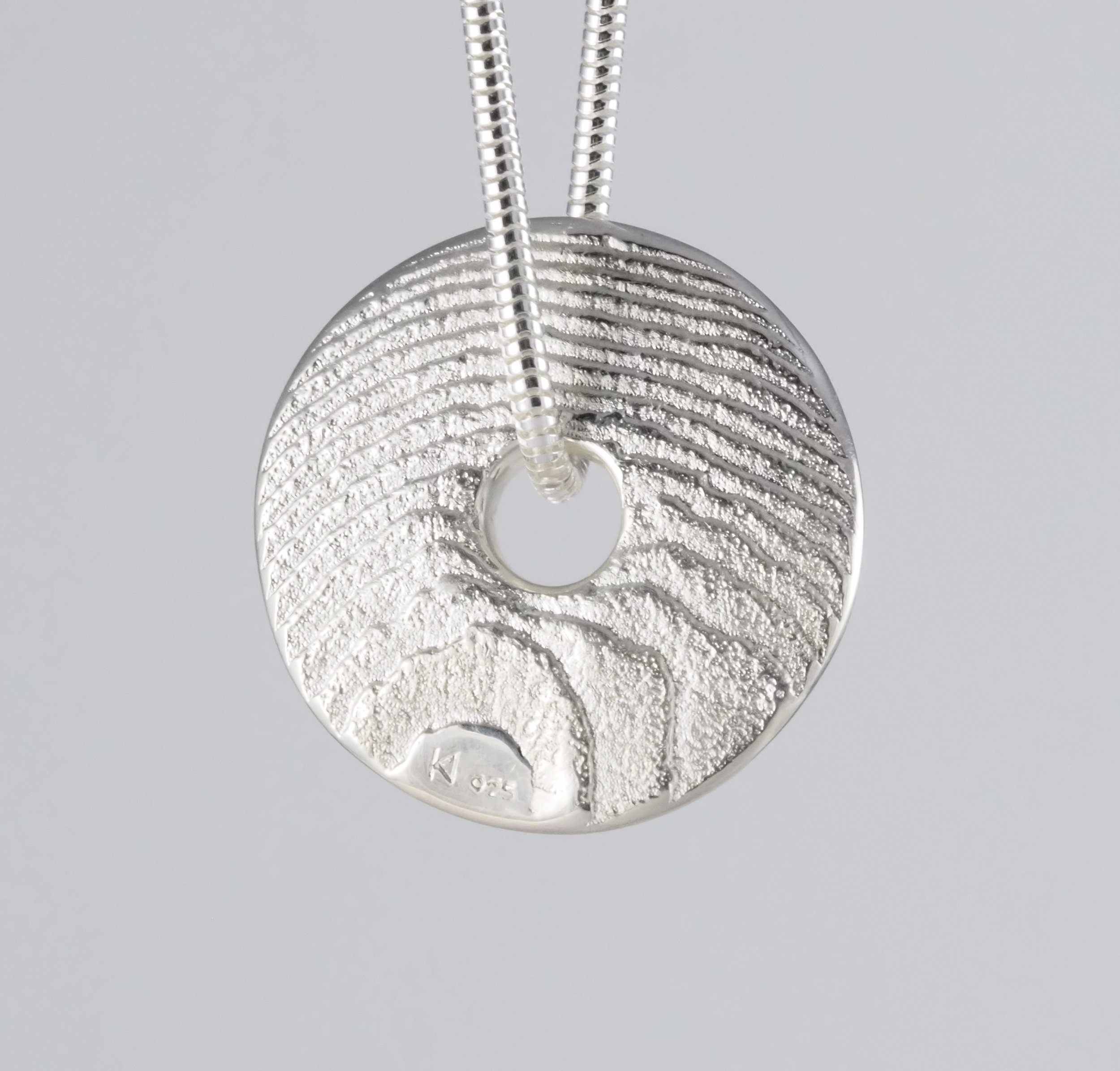 Double sided circle of the sea pendant in sterling silver