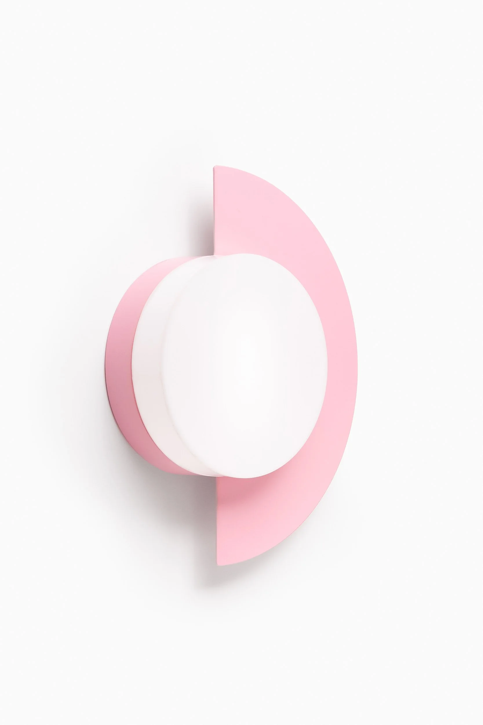 A minimalistic artwork consisting of pink and white geometric shapes on a white background, resembling an abstract face or object.