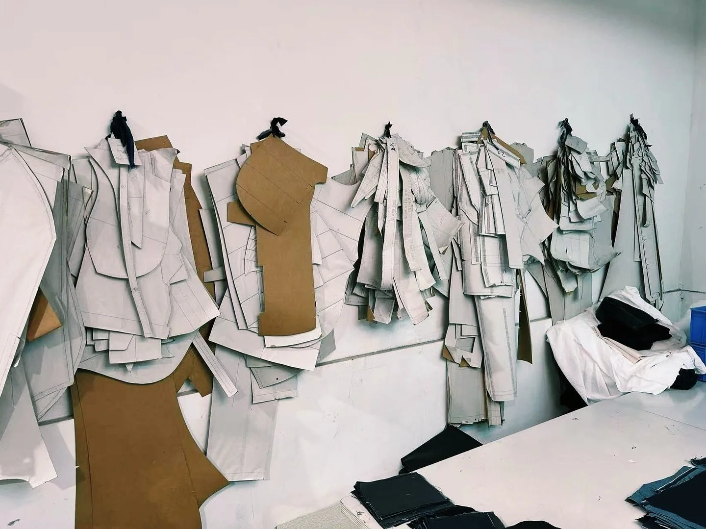 Before a single stitch is sewn, every garment begins with precision on paper.
Our skilled pattern makers transform design sketches into accurate templates; the blueprint that ensures every cut, seam, and curve is perfect ✂️