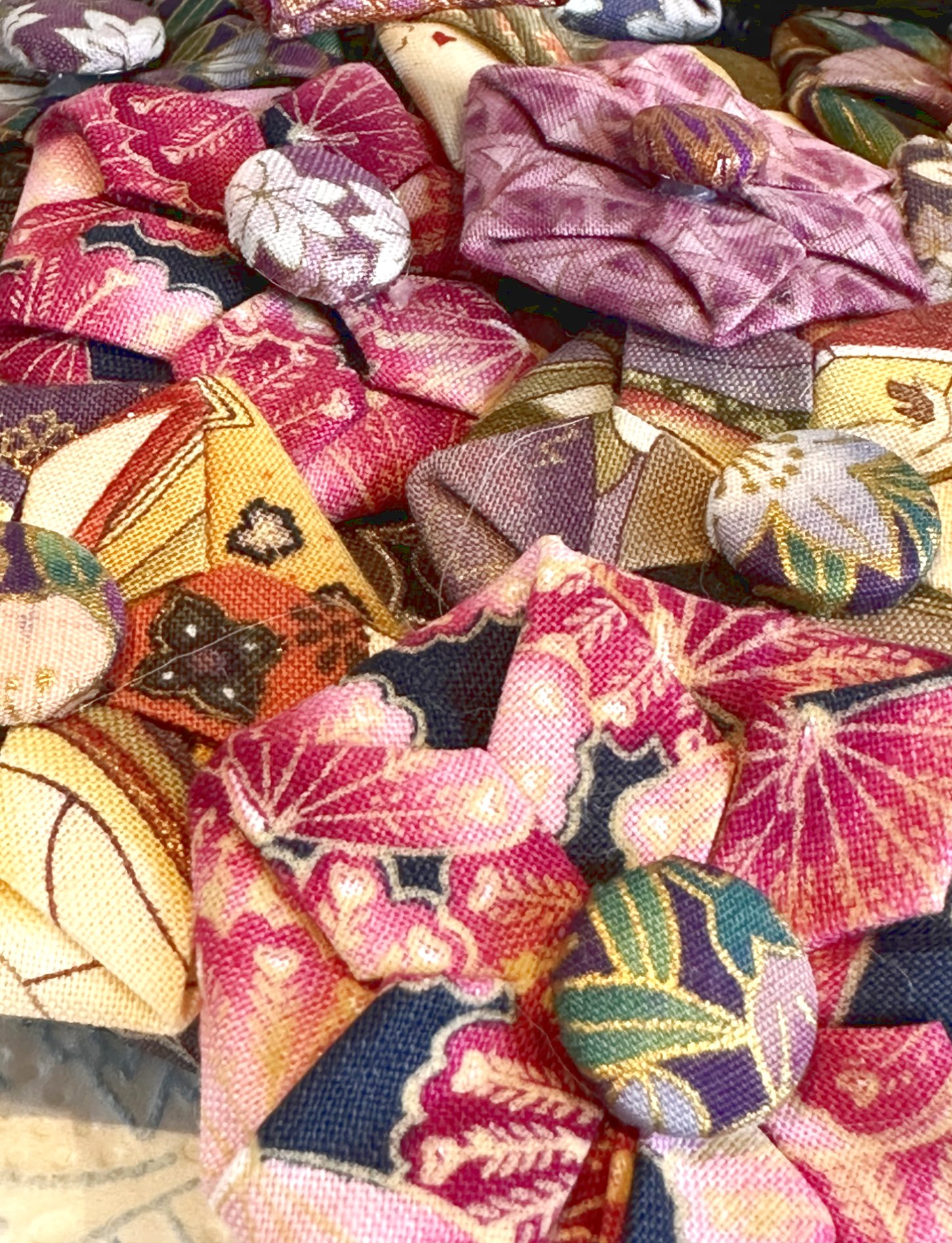 Japanese Garden (Spring), textile sculpture in spring blossom colours showing detail of Japanese cotton fabric origami flowers.
