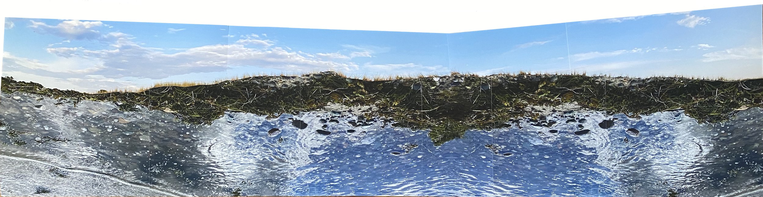 this cut-paper photo collage is 60"x15"