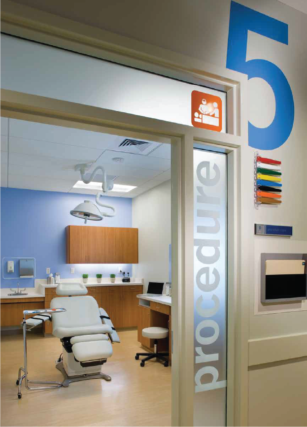 Medical procedure room with chair and equipment, labeled "Procedure 5"