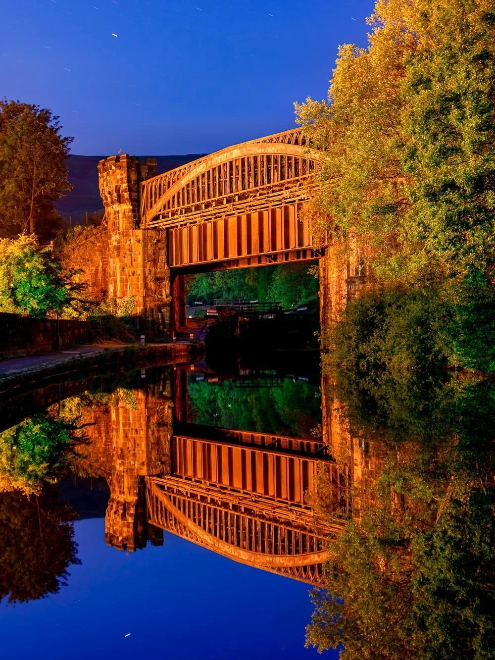 Gauxholm+Railway+Viaduct+reflected+on+the+rochdale+canal+at+night+Todmorden.jpg