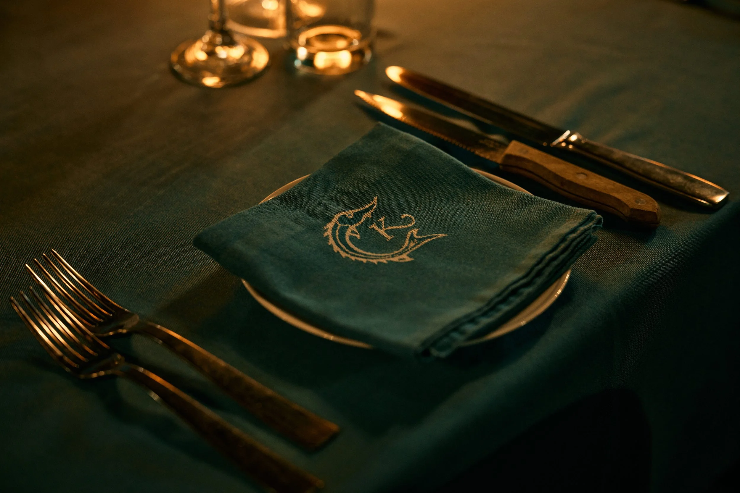 A monogrammed napkin and place setting at The Jade Room