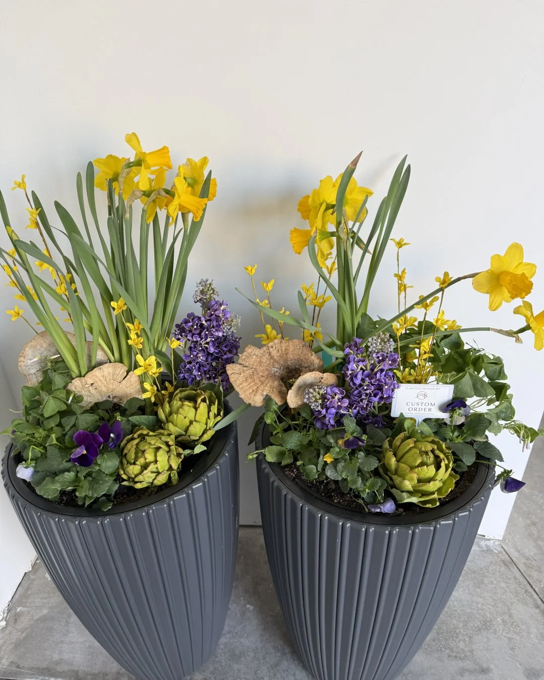 Spring is here and I couldn&rsquo;t be happier! I used a combination of cold-tolerant live plants, faux stems, and a few fun accents to create these bright, cheerful pots.

I don&rsquo;t generally design spring pots because, as this week proves, spri