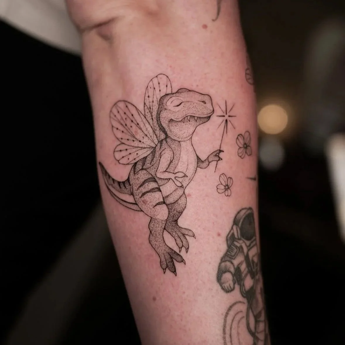 Dinosaur fineline tattoo