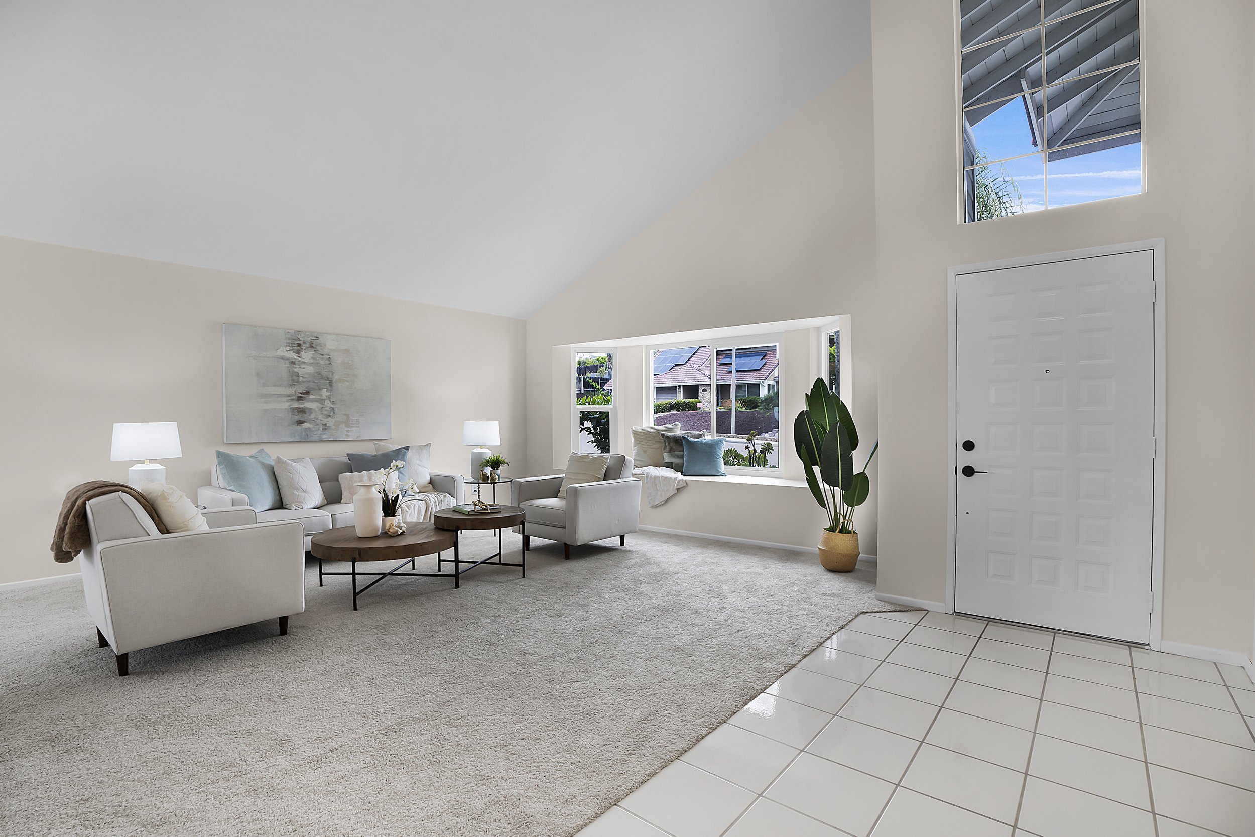2071 Monaco St - living room with front door on the right.
