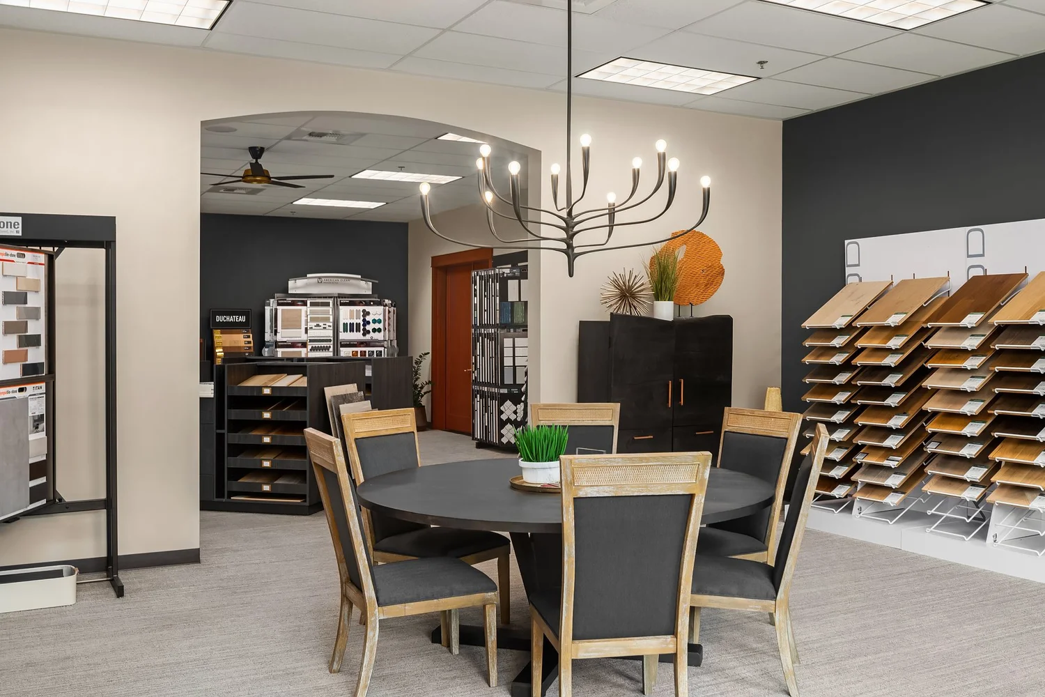 Consultation table beside interior finish displays