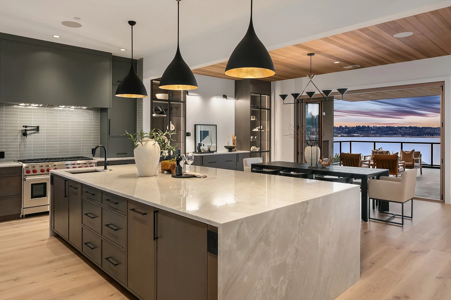 Light-filled new home with a coordinated kitchen, wood flooring, and a welcoming living space