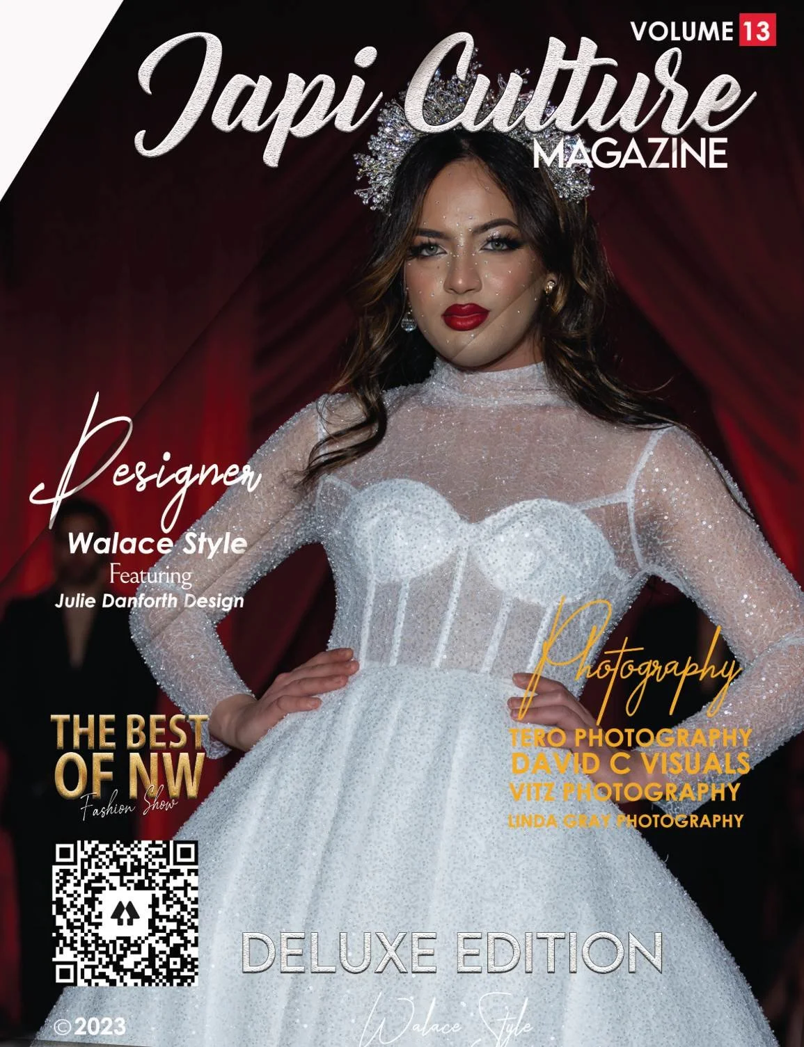 Magazine cover titled "Japi Culture MAGAZINE, Volume 13" featuring a woman with dark hair, red lipstick, and wearing a white, glittery dress with a sheer top and a crown, standing in front of red curtains.