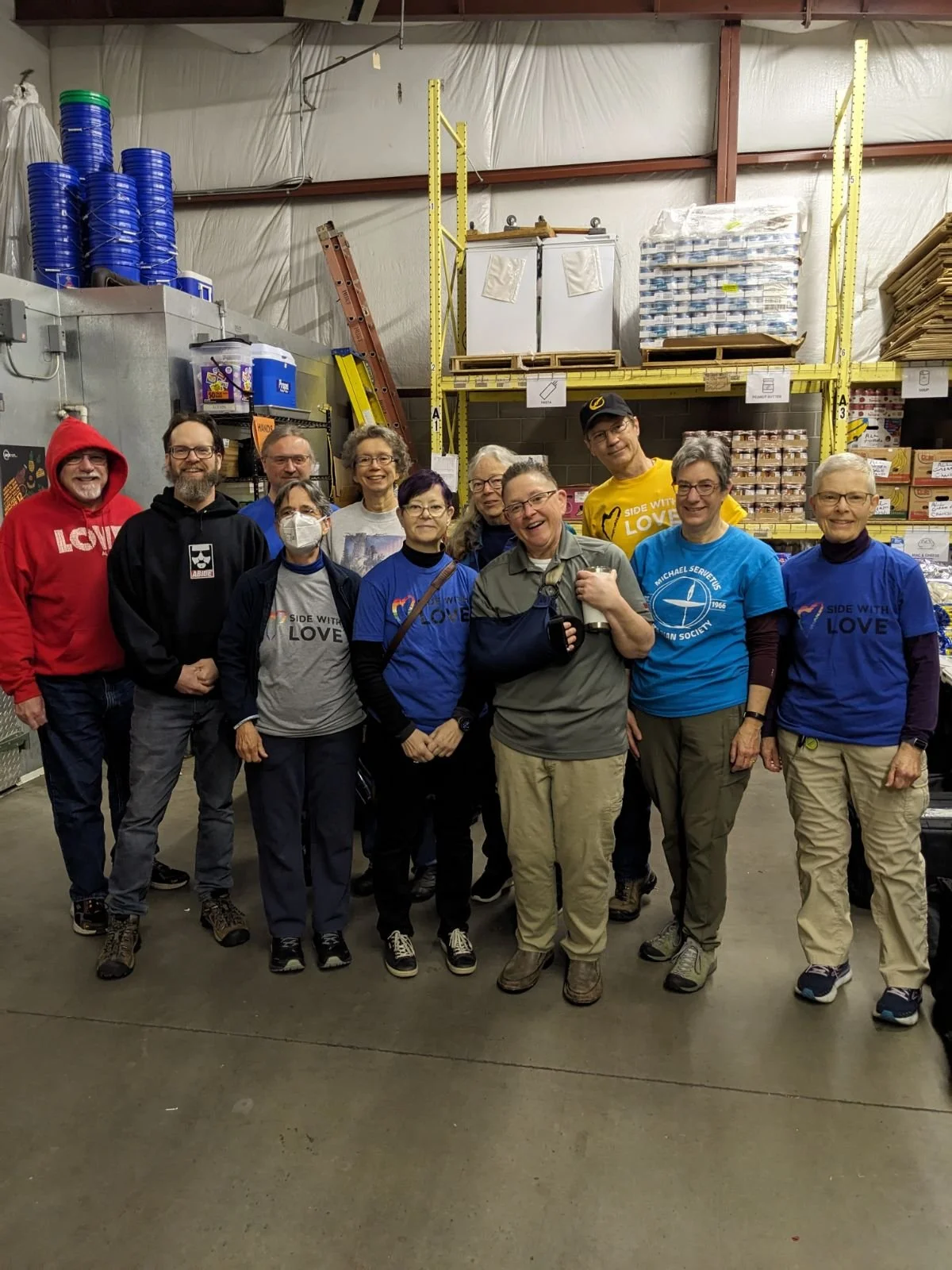 MSUS volunteers - 11 of the 14 who packed over 4000 pounds of food at Southern Anoka Community Assistance (SACA) Food Shelf.