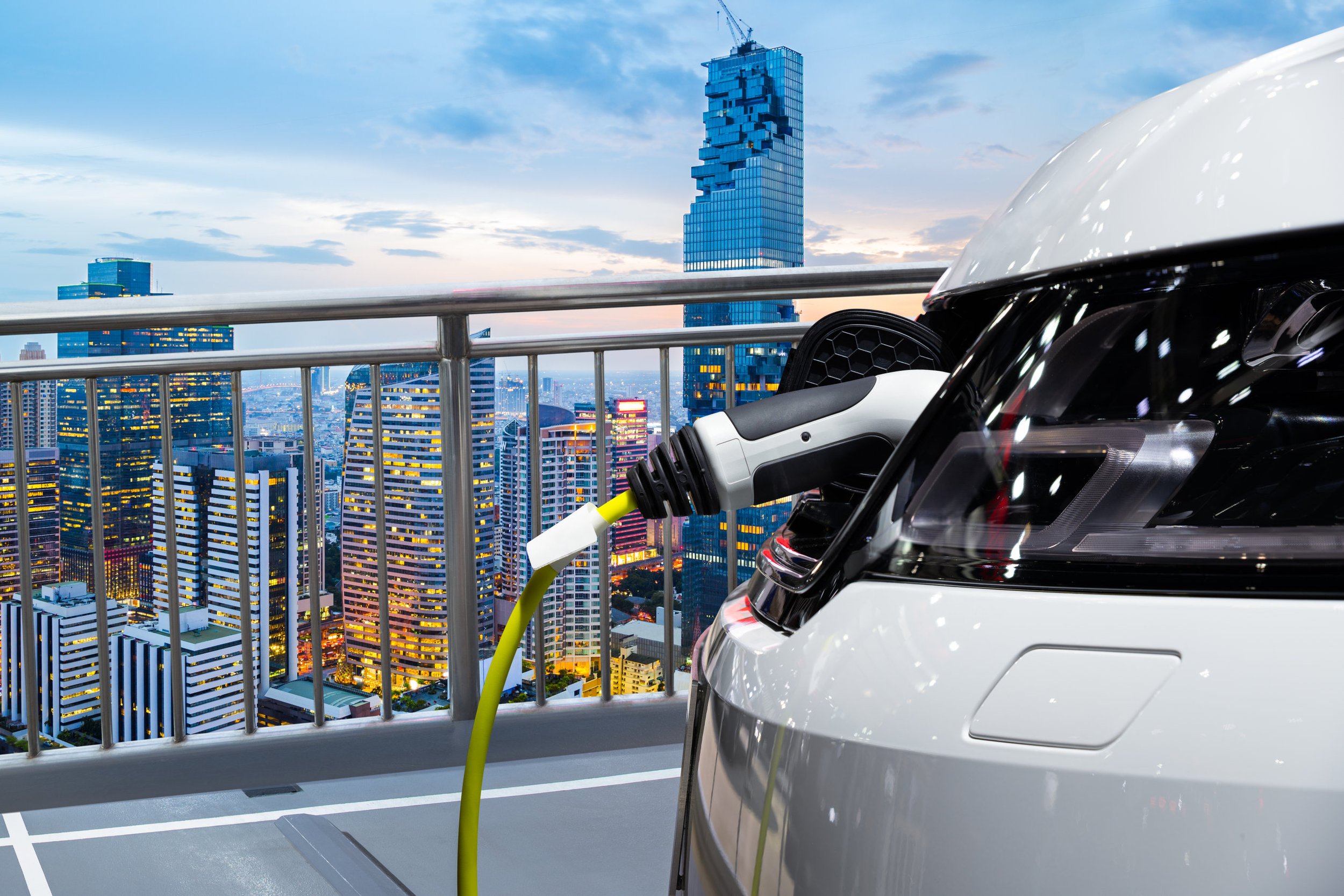 Negotiate contracts for the installation of EV charging stations on client properties