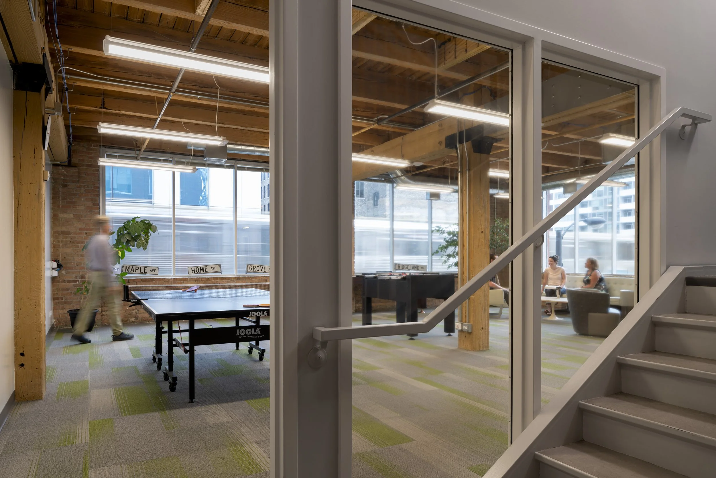 Adaptive reuse of historic Chicago timber framed building in River North for commercial tenants in multi-unit building