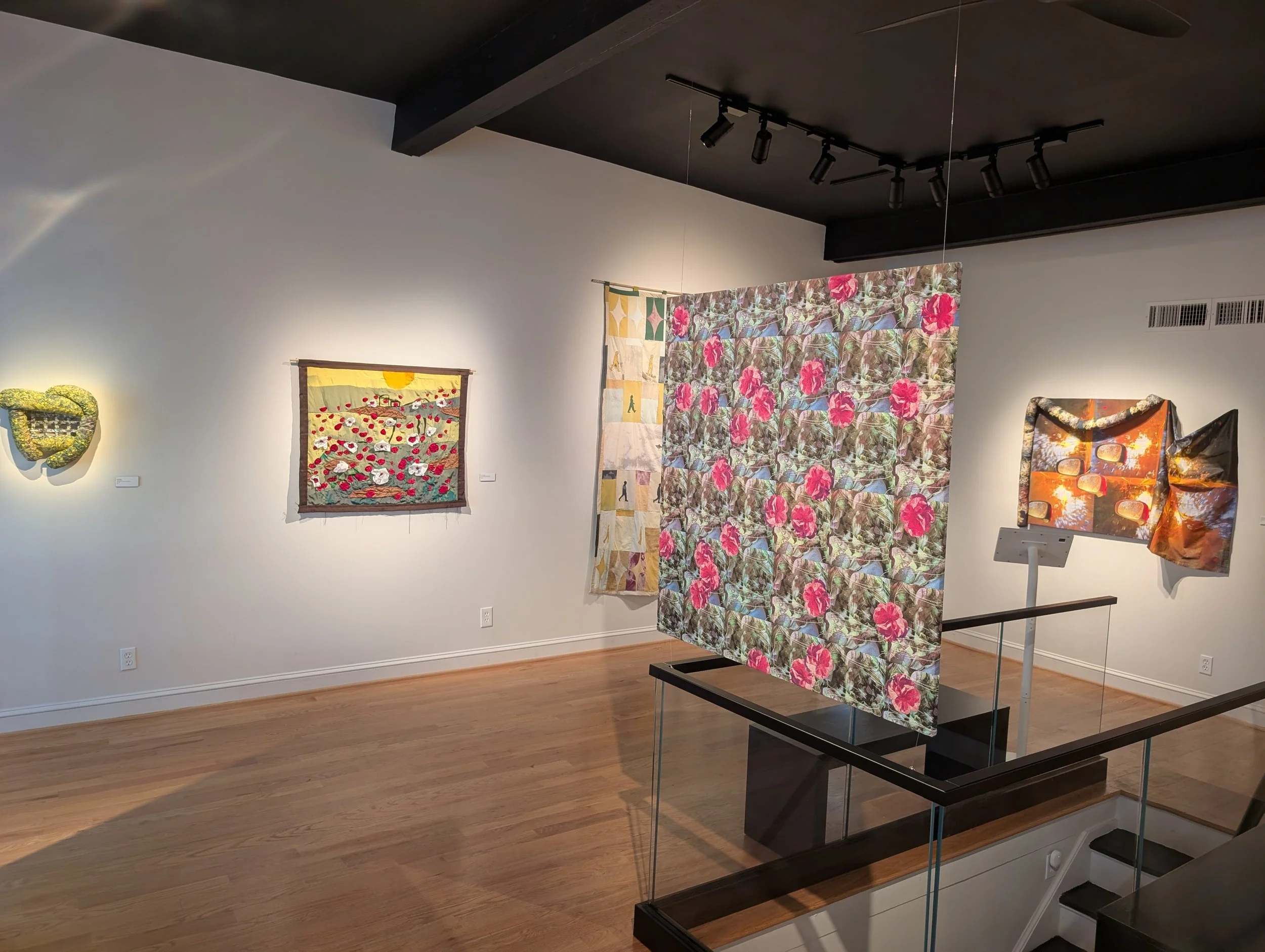 Exhibition overview with "Pink Rose, Soft Body" by Eliza Clifford floating in foreground