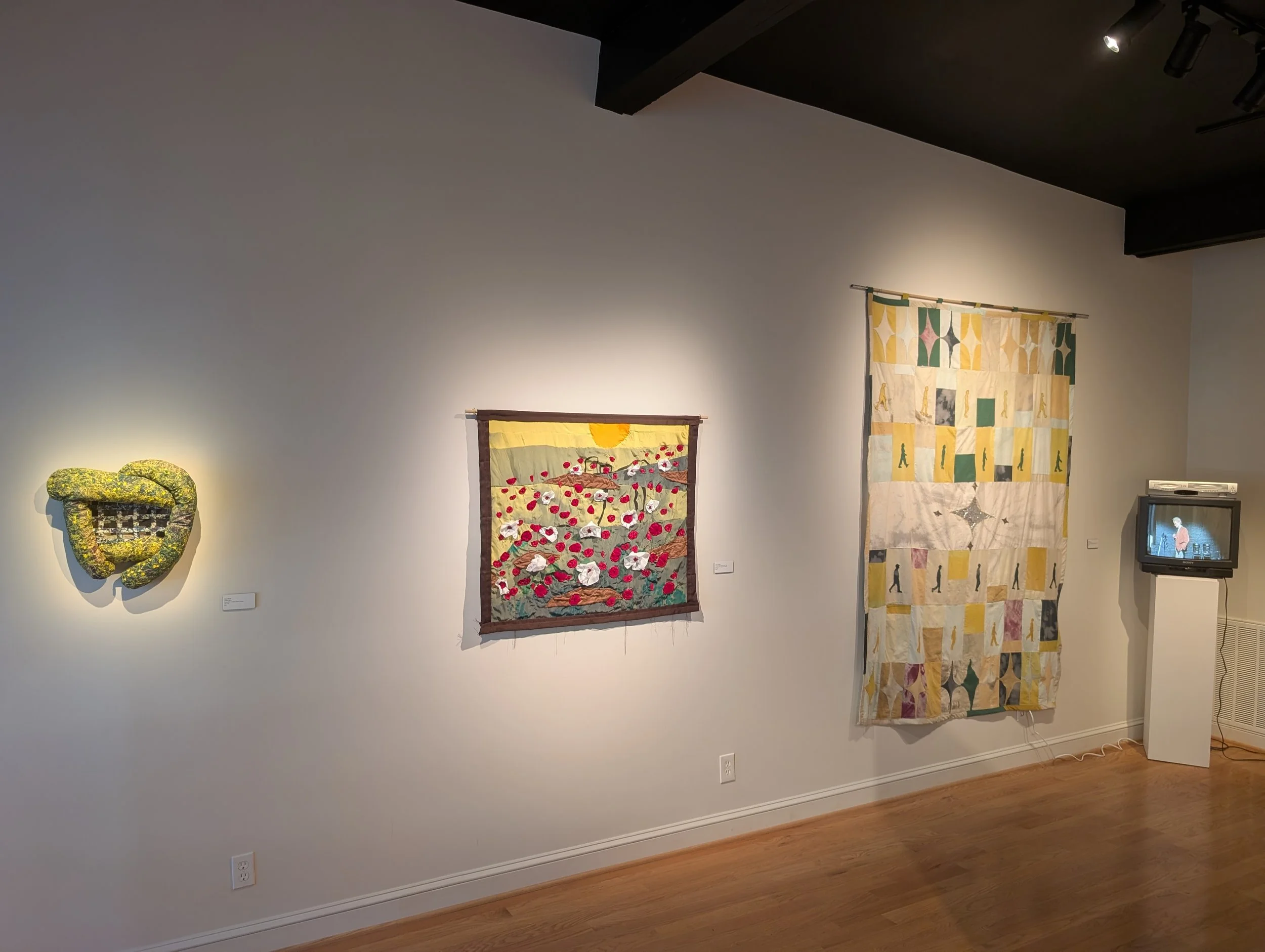 "Looking" by Eliza Clifford (left)
"The Land Grows Through its Scars" by Lucas J Rougeux (middle)
"Run Don't Walk" by Izy Carney (right)