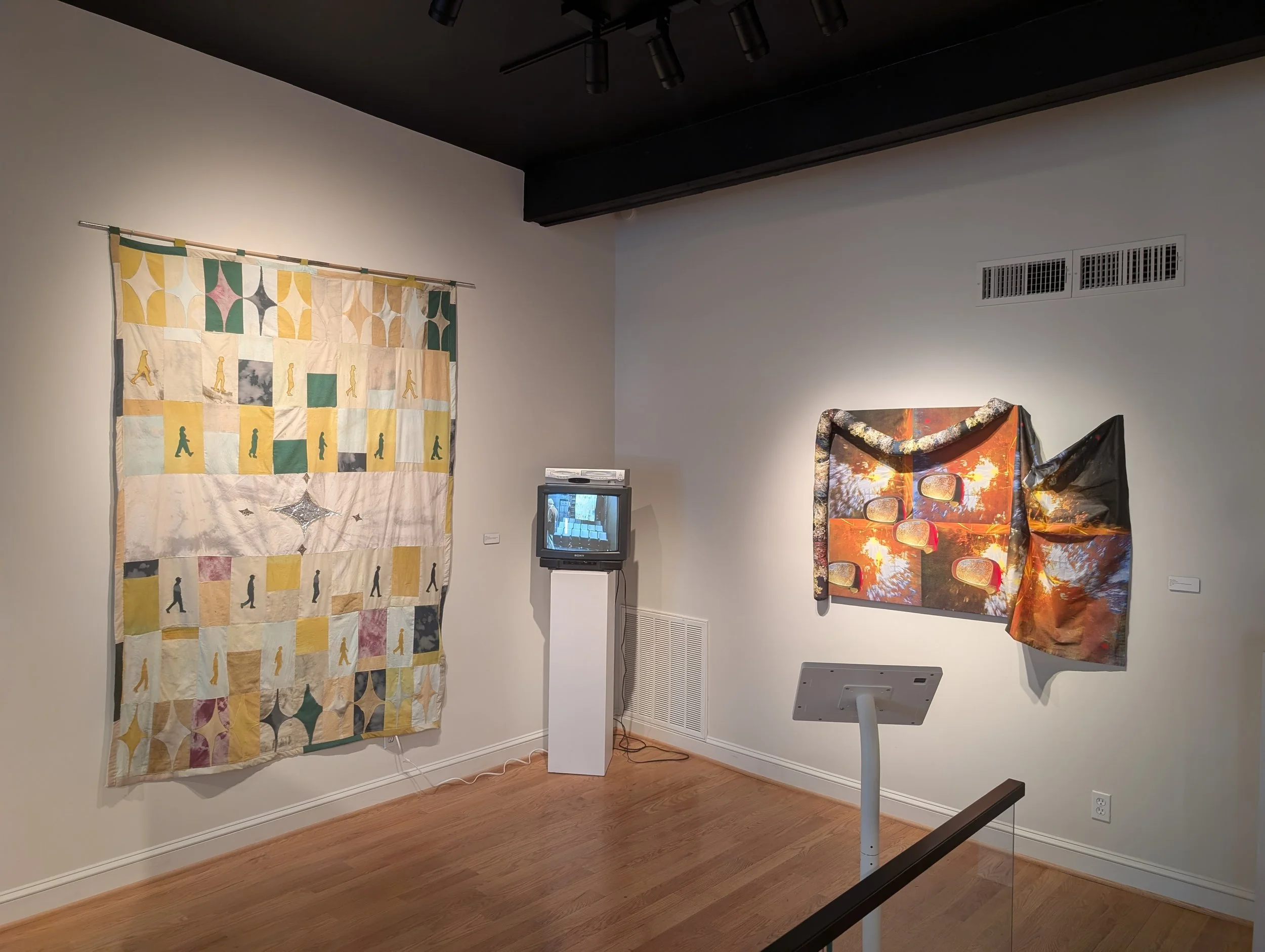 "Run Don't Walk" by Izy Carney (textile and video on left)
"Night Drive" by Eliza Clifford (textile on right) 