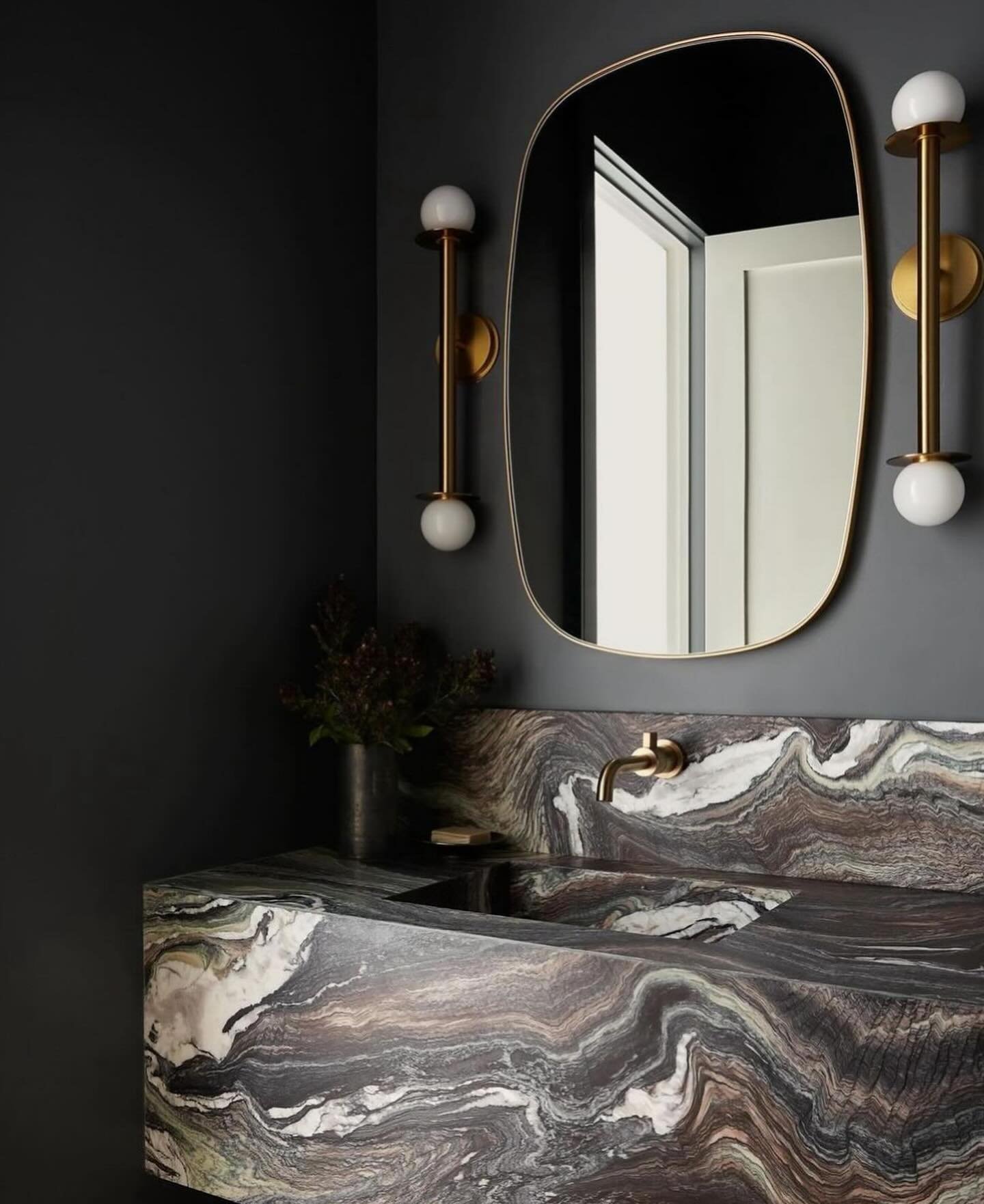 Nothing beats real stone!!

🖤

#interiordesign #interiordesigner #architecture #architect #bathroomdesign #powderroomdesign #marble #marblesink #integratedsink #luxury #luxuryhomes