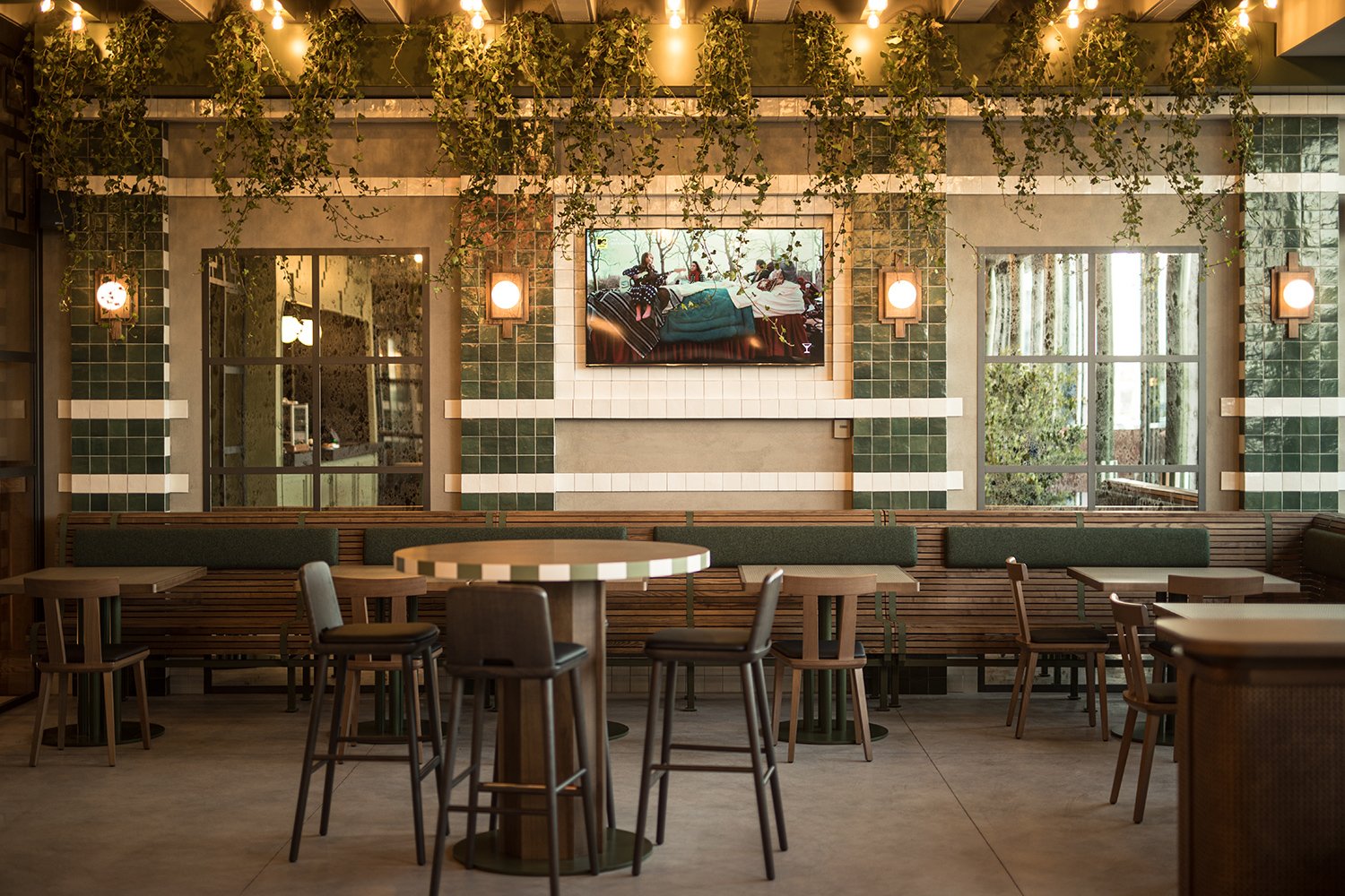 Saving this hospitality design inspiration for later. ✨

What caught my eye about this Wiener Haus location is how well it blends warmth, comfort, and functionality. The natural wood finishes, layered lighting, cozy booth seating, and open layout cre
