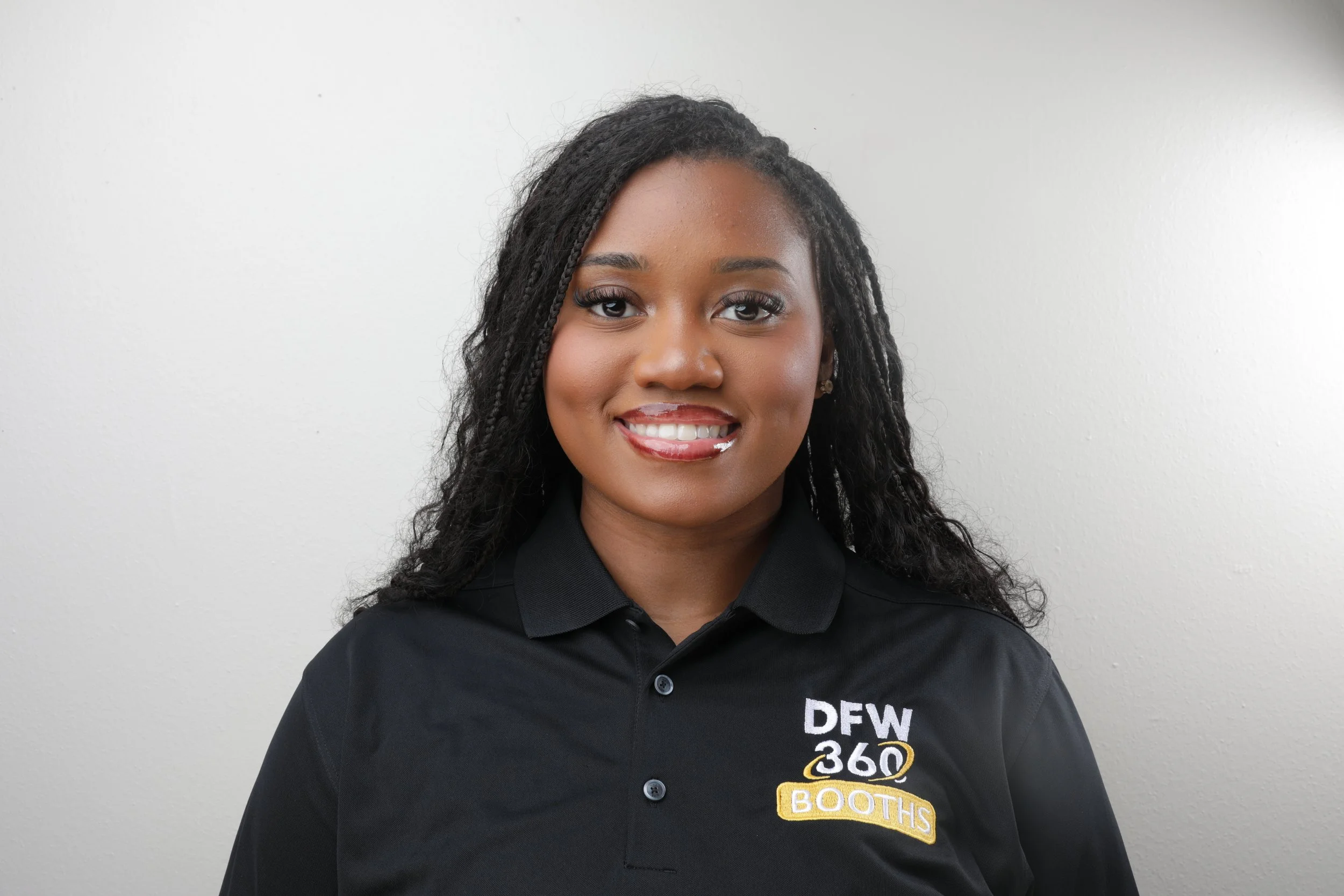 Headshot of Imani Kayembe, our social media manager and content creator.