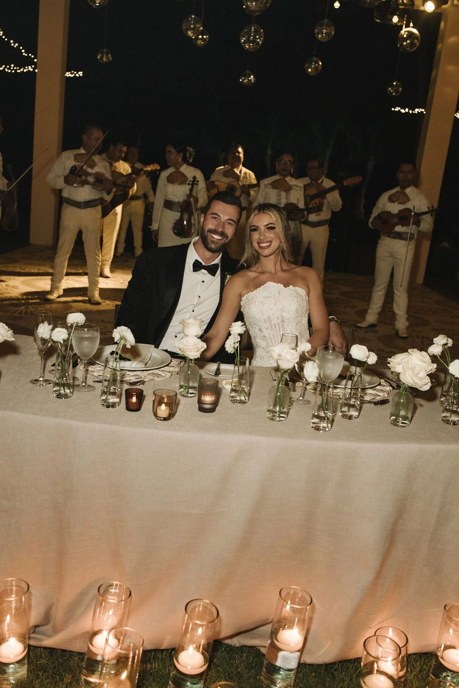 Sweetheart table with mariachi behind it at Grand Velas Riviera Nayarit