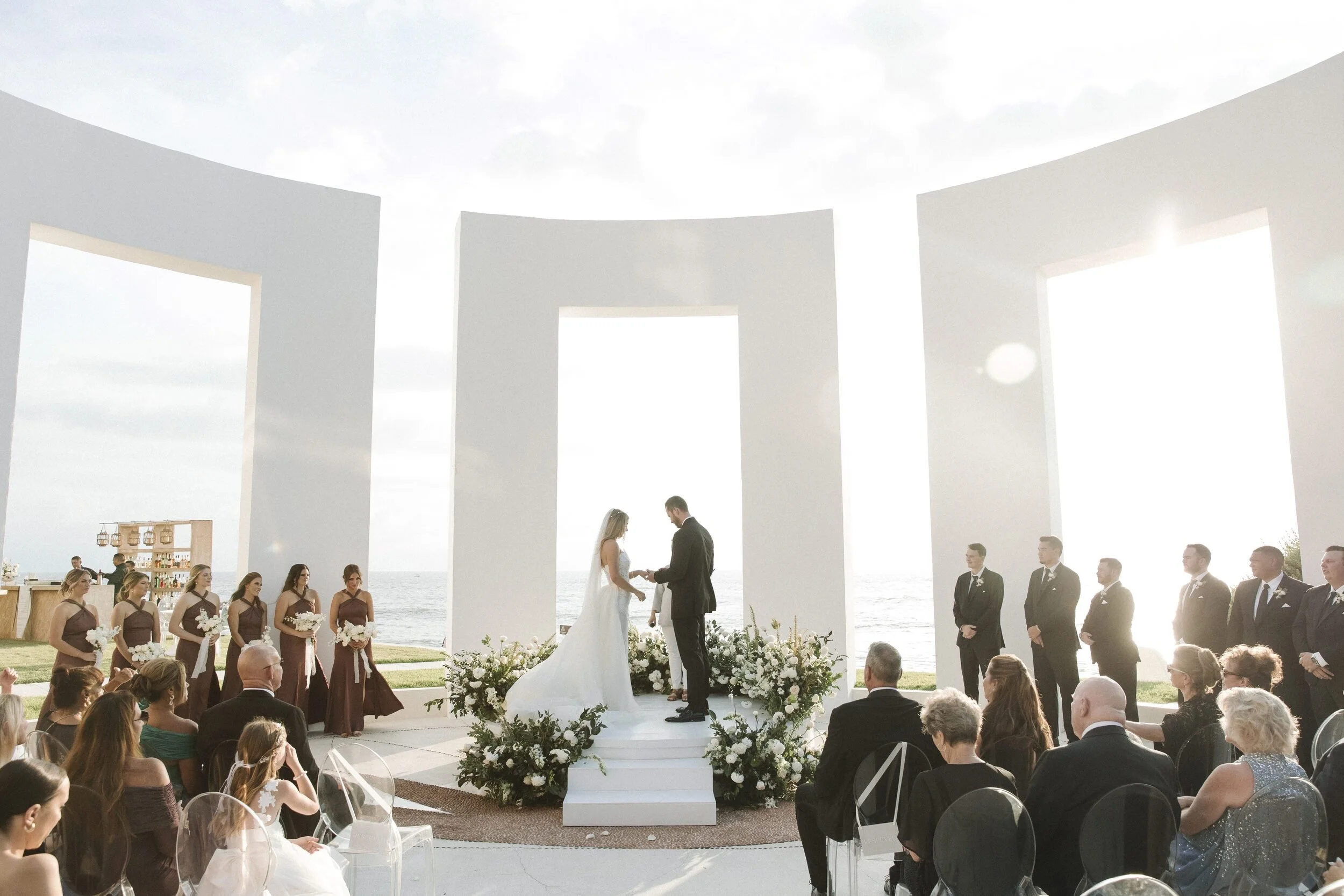 Beachfront ceremony with guests at Grand Velas Riviera Nayarit