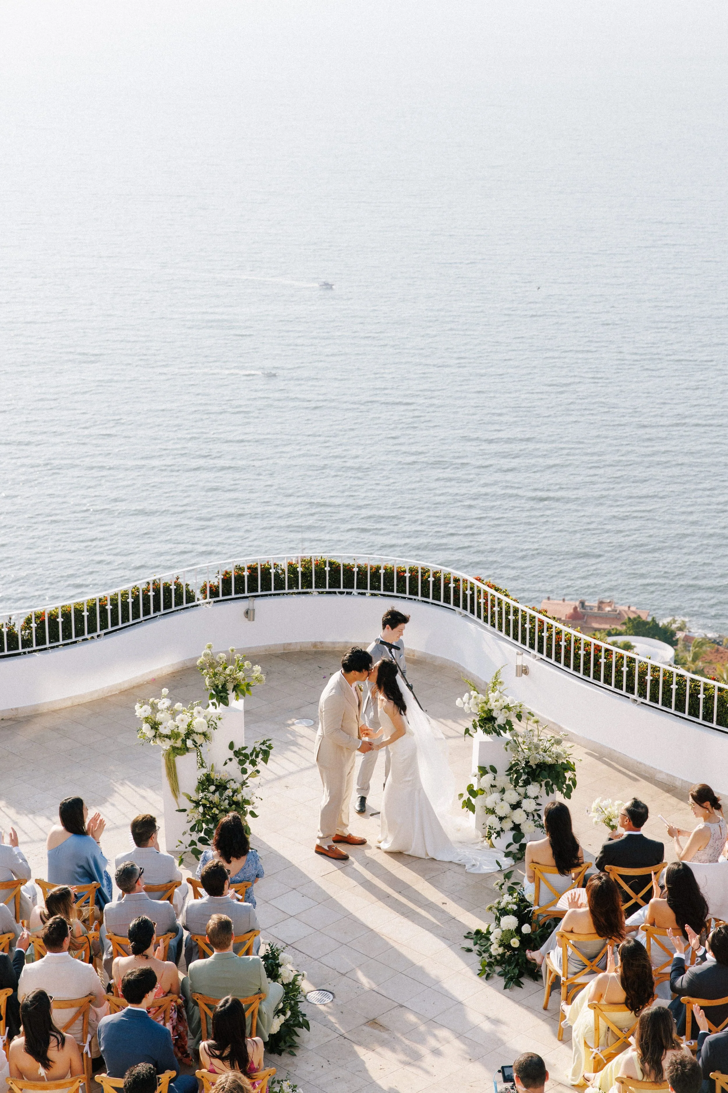  Bride walking down the aisle with her father at a Grand Miramar wedding 