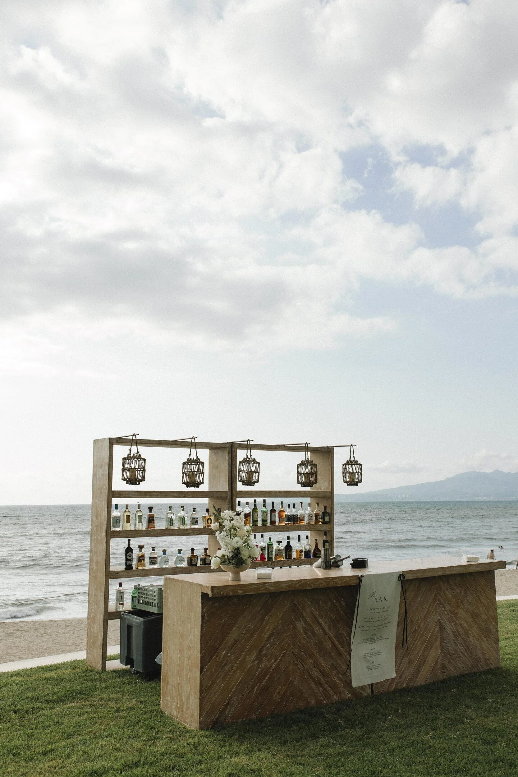 Wooden cocktail bar on the beachfront lawn at Grand Velas Riviera Nayarit