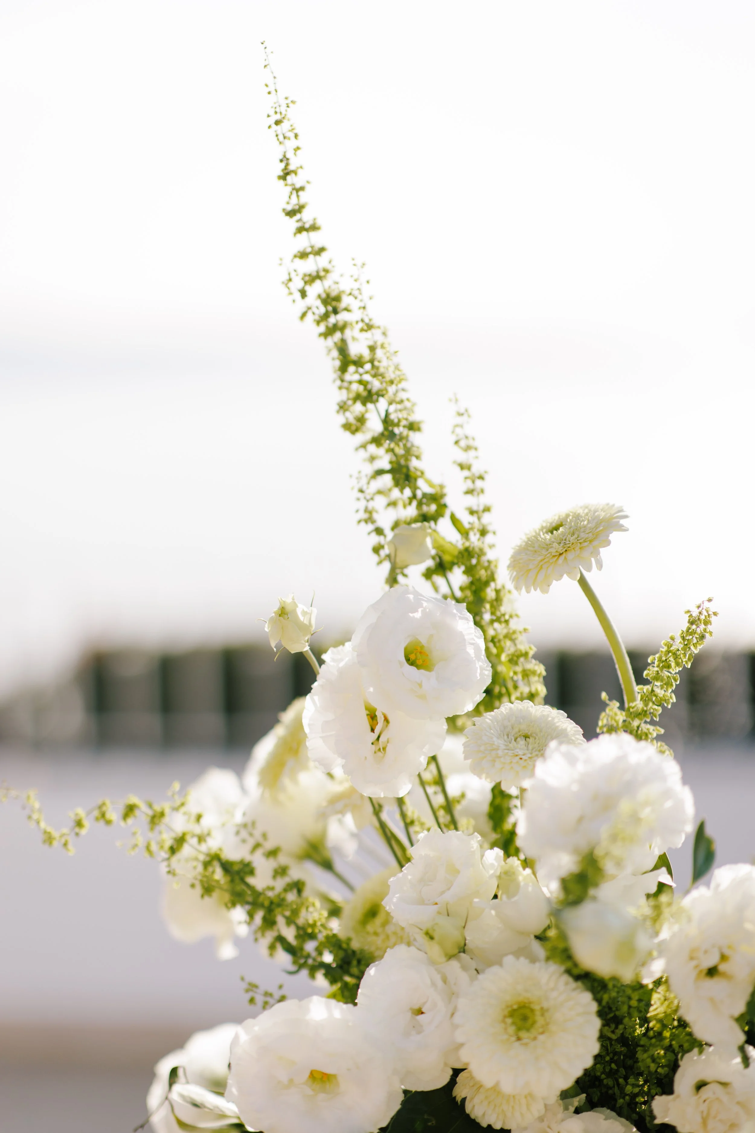 Tall white ceremony arrangement above Banderas Bay at Grand Miramar, Puerto Vallarta