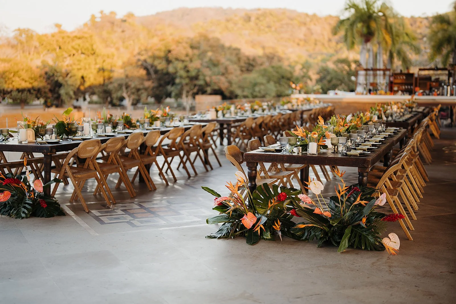 Long reception tables at golden hour at Tierra Tropical Polo Club, San Pancho