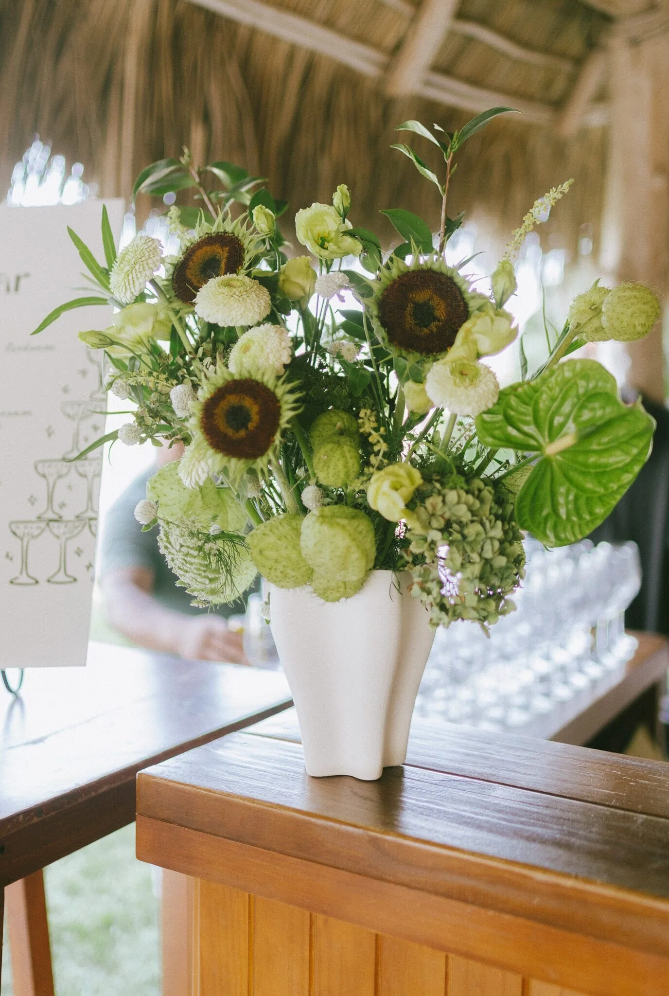 Green and white bar arrangement with anthurium at a Sayulita wedding