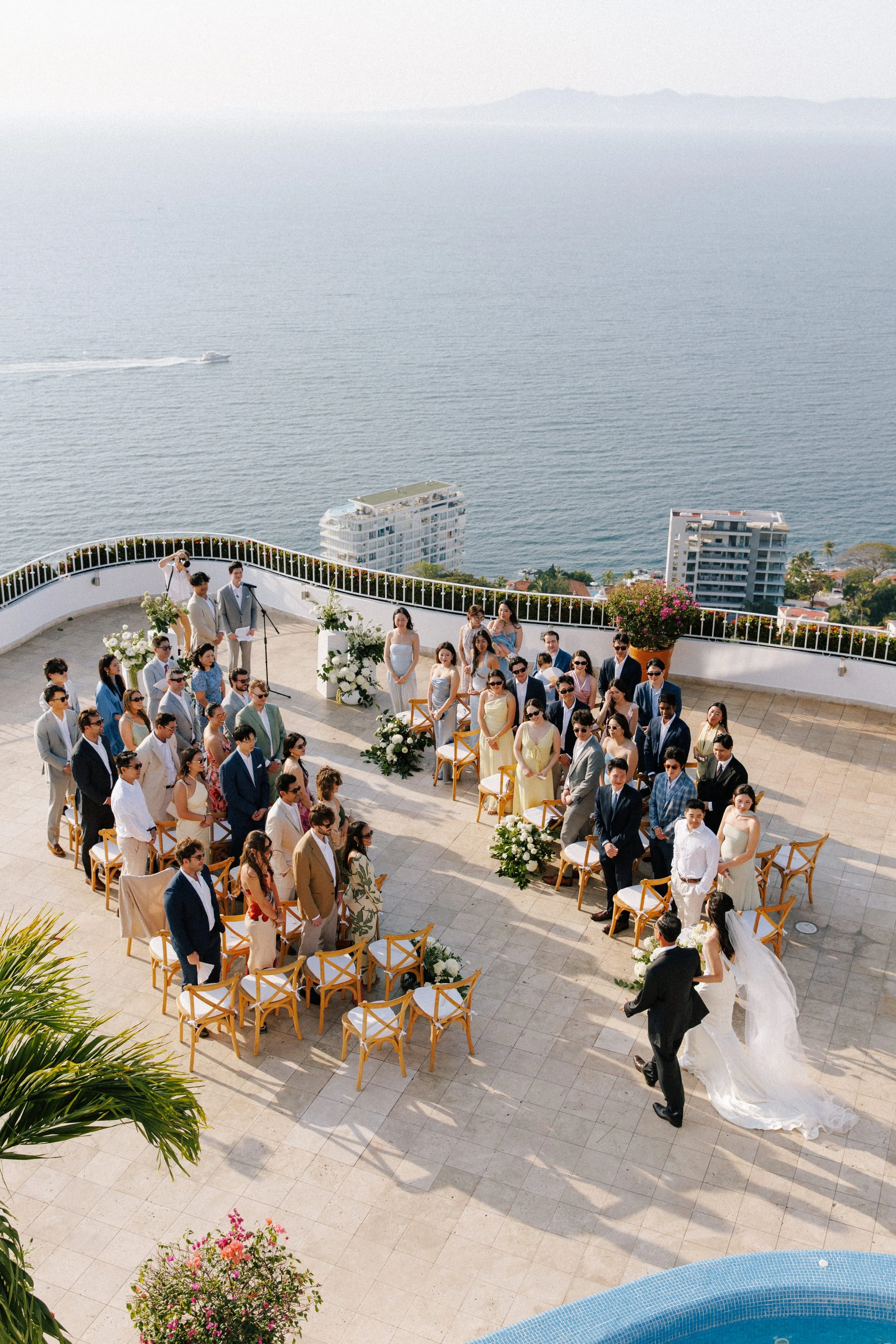 Ceremony and guests on the terrace above Banderas Bay at Grand Miramar