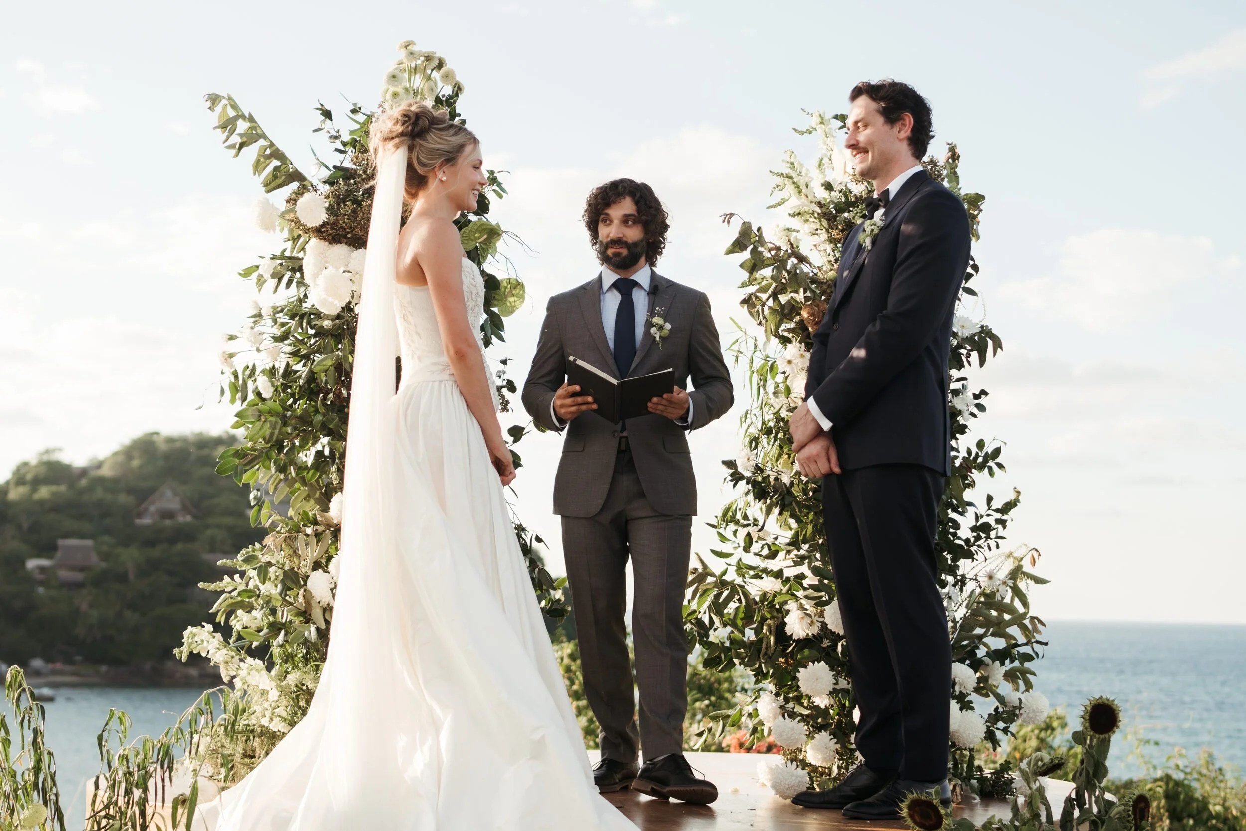 Green and white oceanfront ceremony in Sayulita, published in Vogue UK