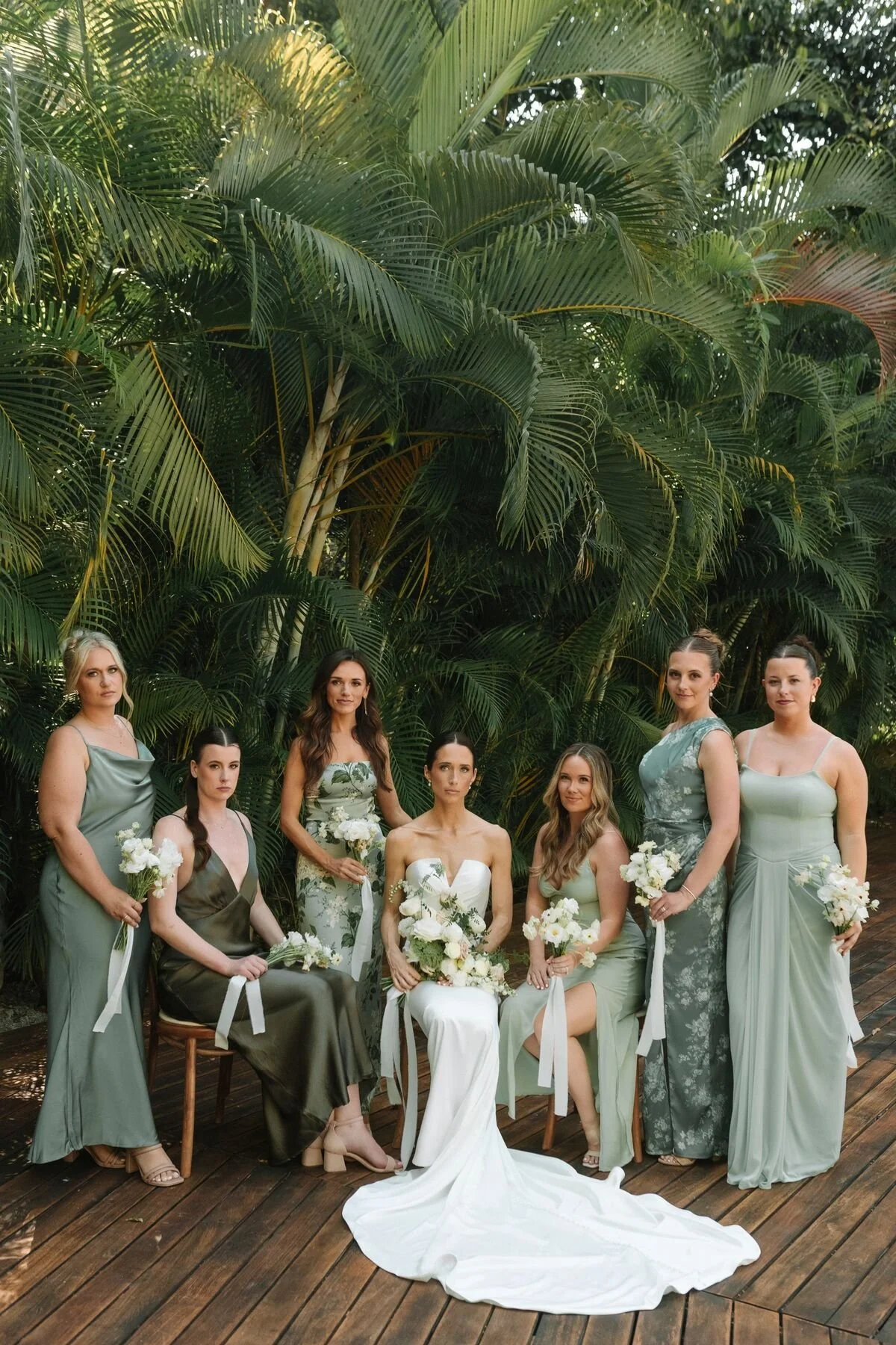 Bride and her bridesmaids with white bouquets at Garza Blanca, Puerto Vallarta