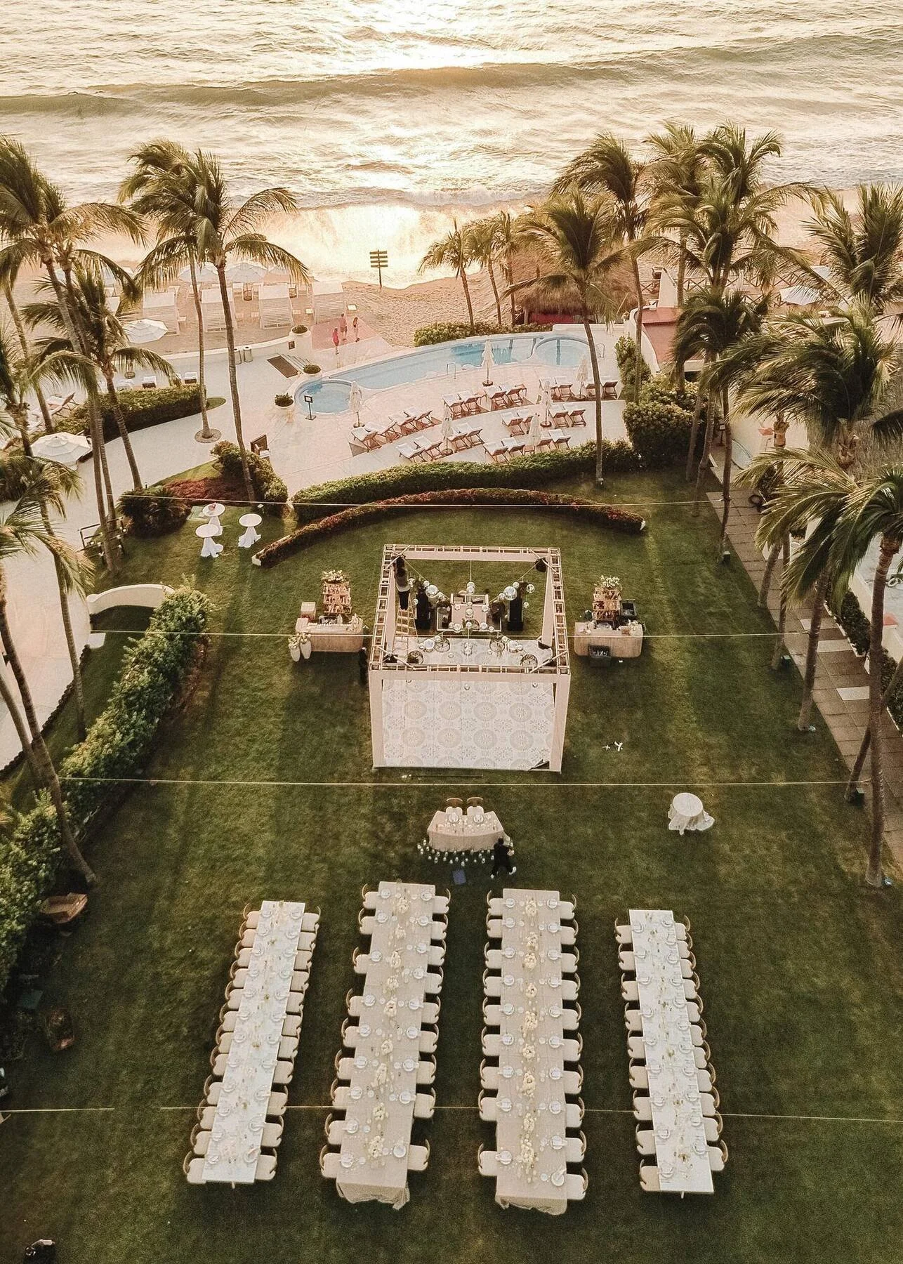 Aerial view of the cocktail lawn and long tables at Grand Velas Riviera Nayarit