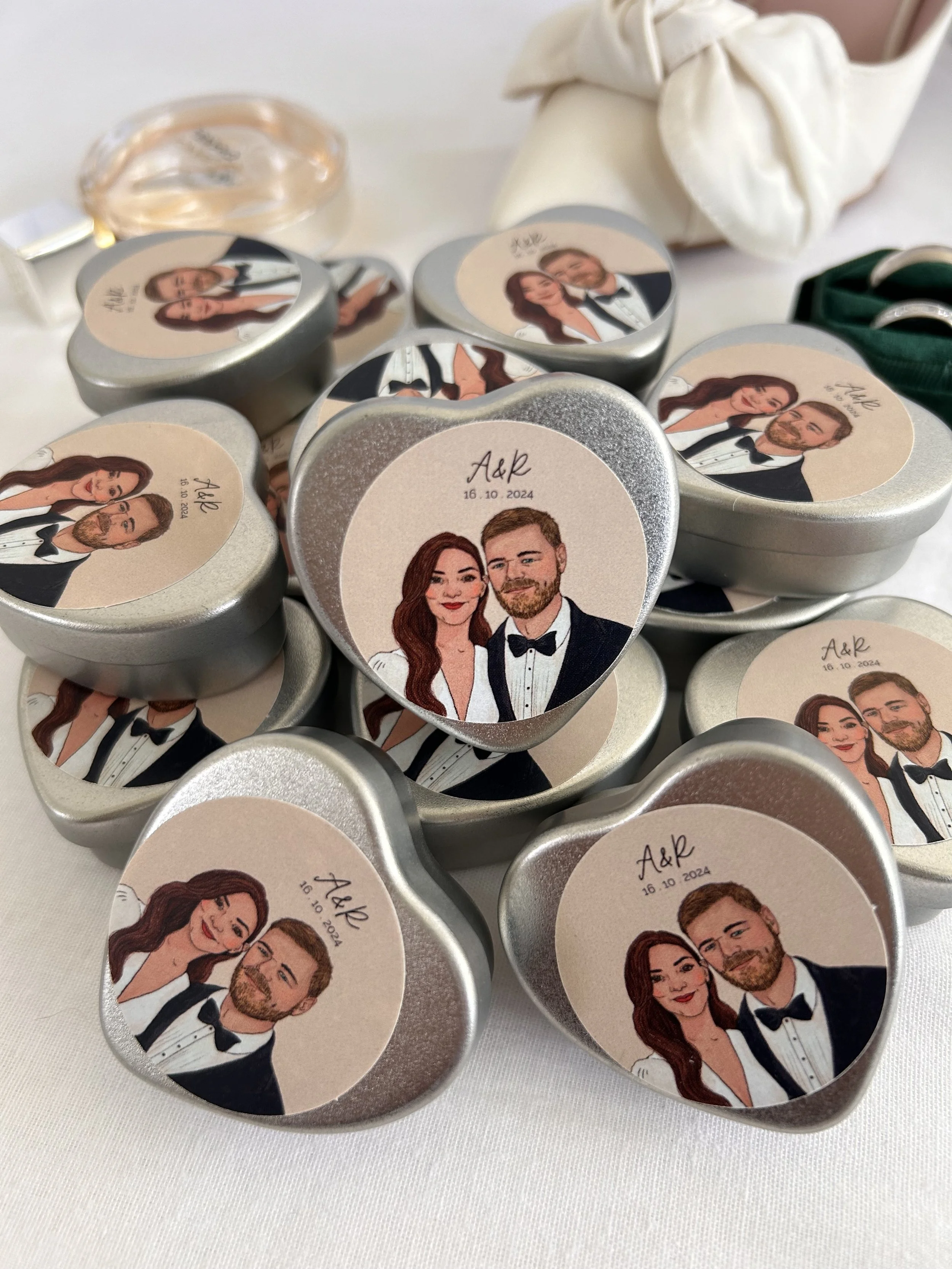 Personalised wedding candle favour with portrait of couple on label for wedding guests UK