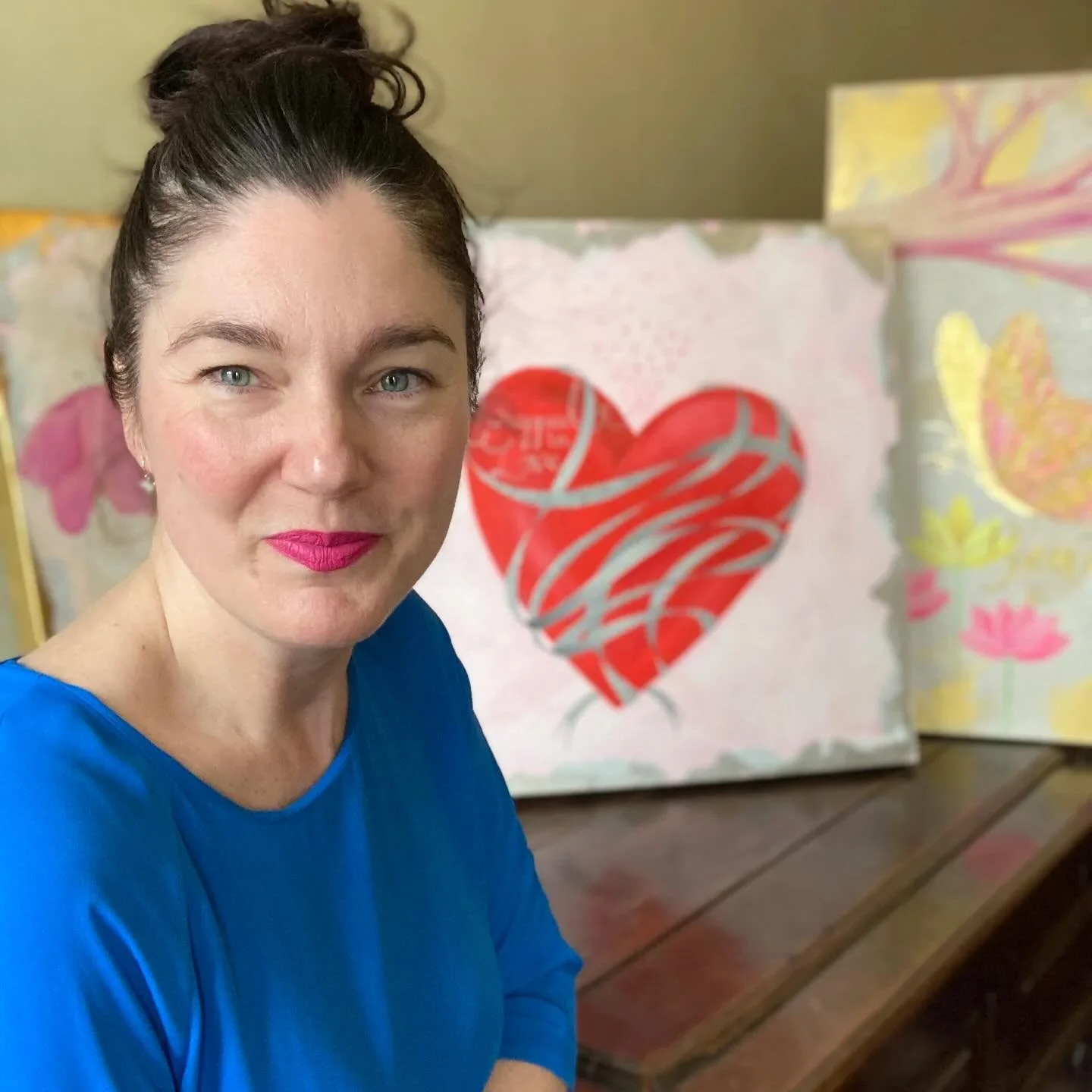 Just me sitting next to what is probably one of my fav paintings EVER. My big red &lsquo;wrapped in love&rsquo; heart. I&rsquo;ll probably never sell her as she brings me soooooo much joy and comfort - a beautiful reminder to me that although my beau