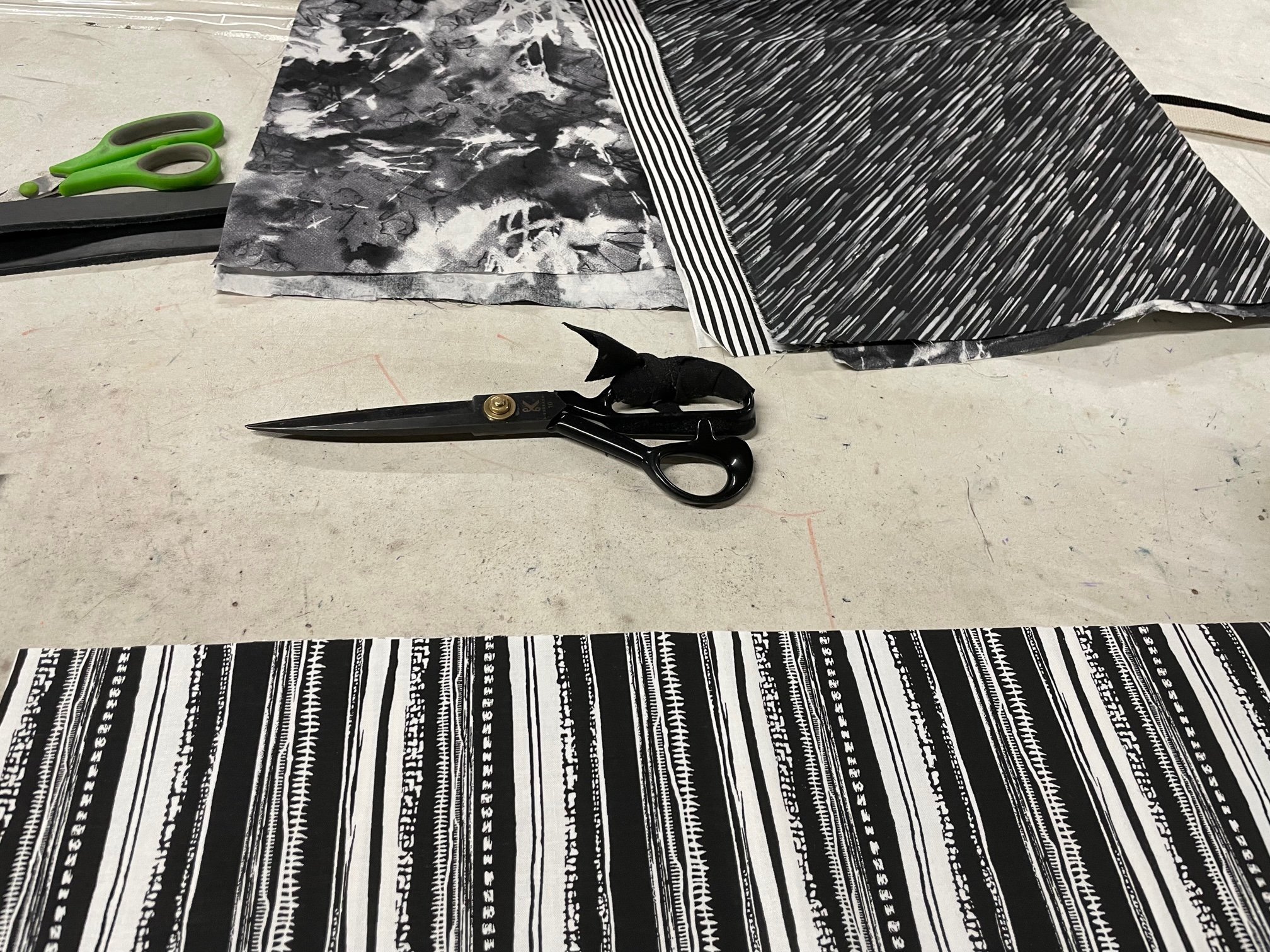Get'm Manufacturing - cutting fabrics.jpg