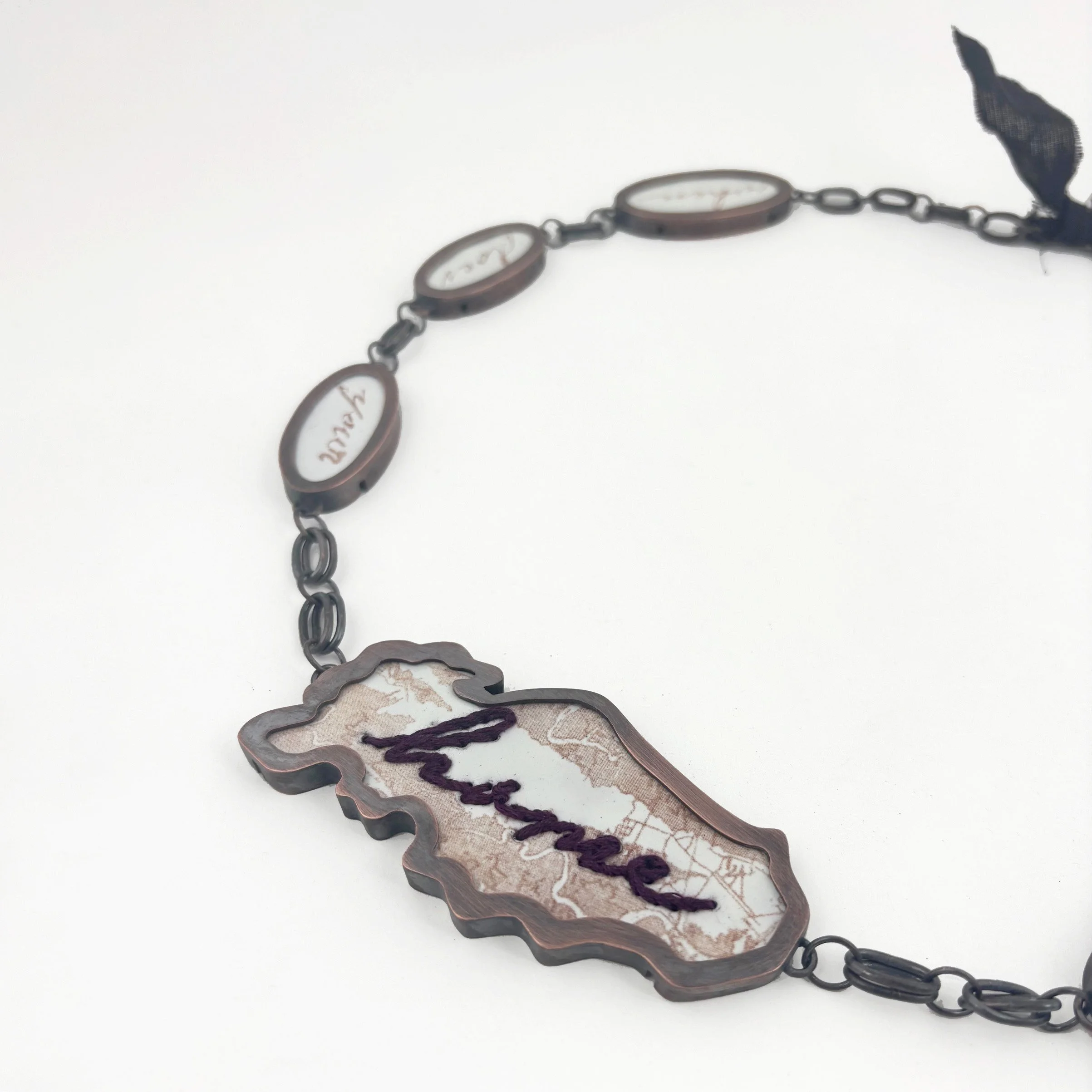 An Enmeshment of Strangers No.1: Home (Detail)
Copper, Enamel, Embroidery Floss, Fabric
2026