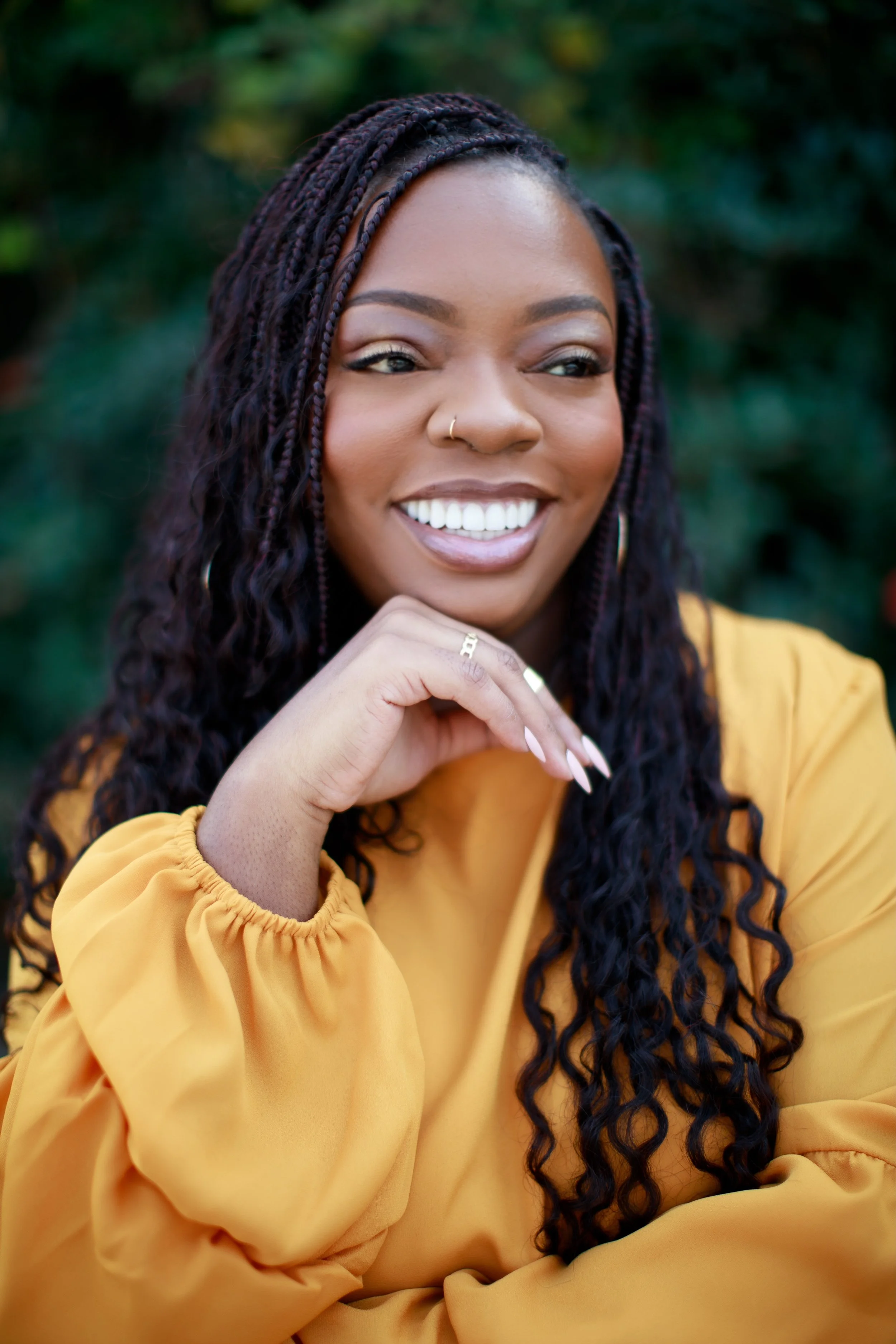 Ashley Jordan smiling and looking to her left.