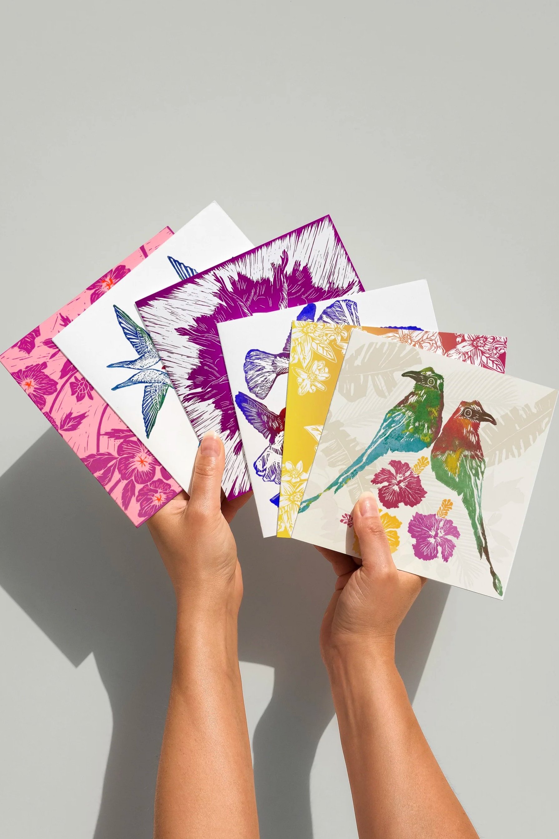 6 lino printed cards featuring tropical birds and flowers
