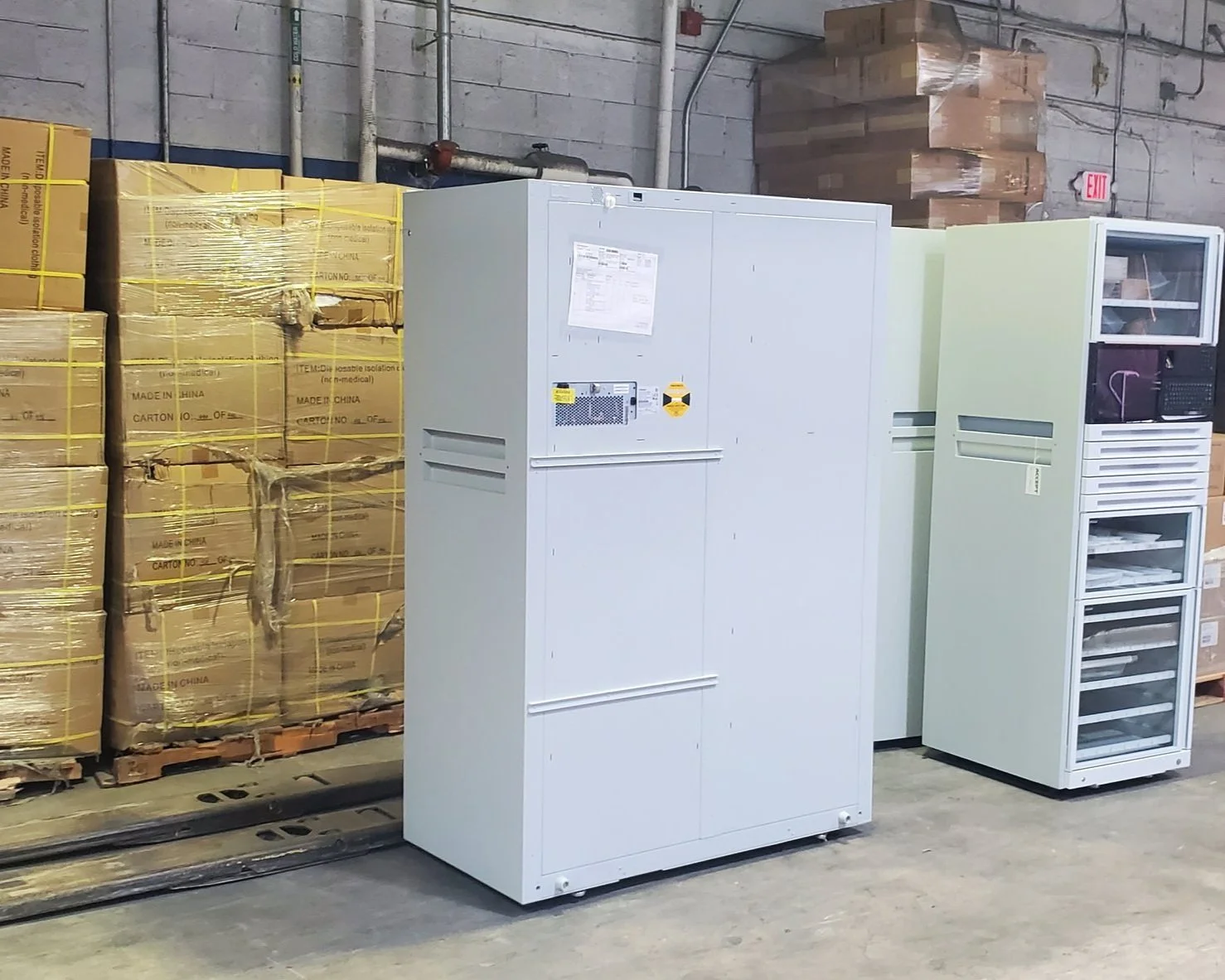 Professional pickup and delivery services featuring industrial electrical cabinets and equipment, securely