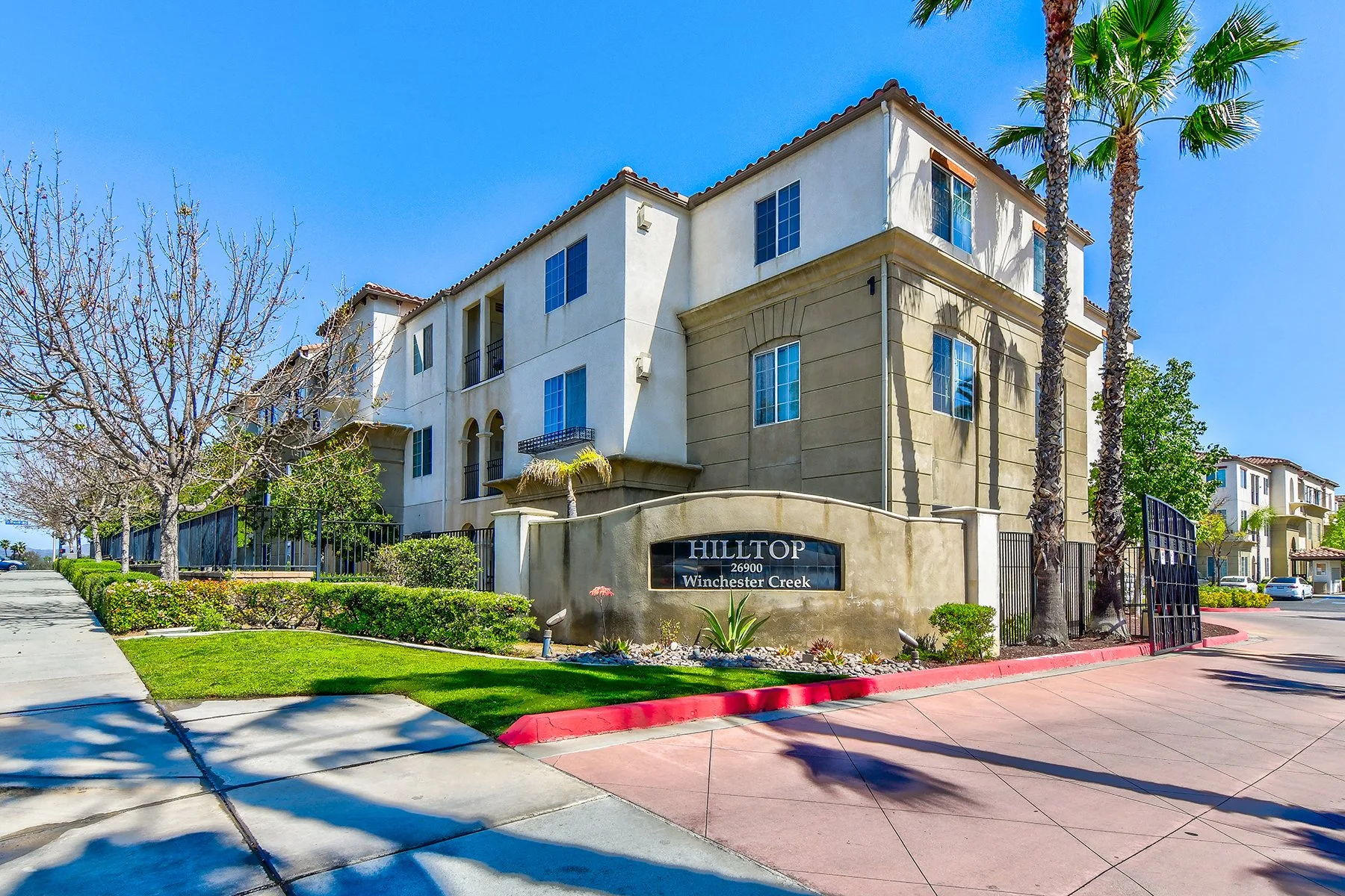 An exterior building photo of the entrance at Hilltop. 