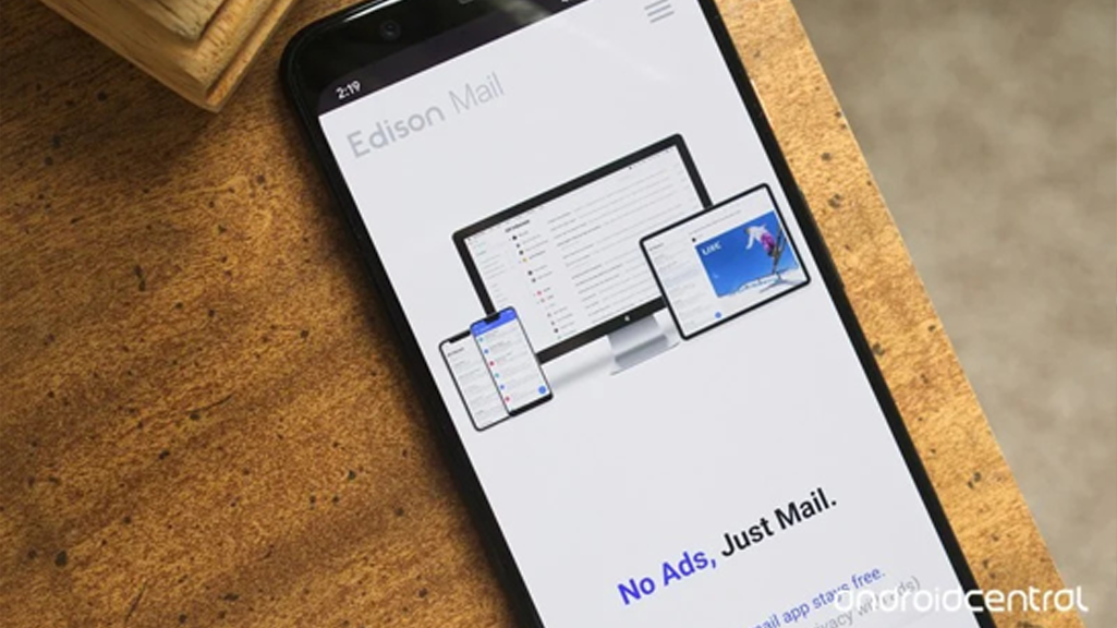edison mail website displayed on a phone sitting on a desk