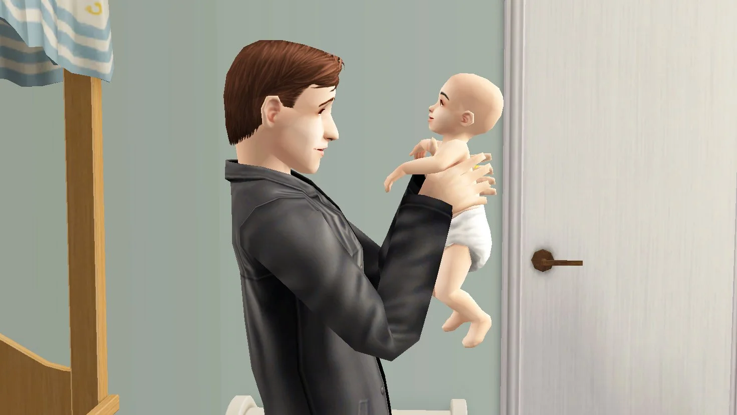 John Burb playing with the baby