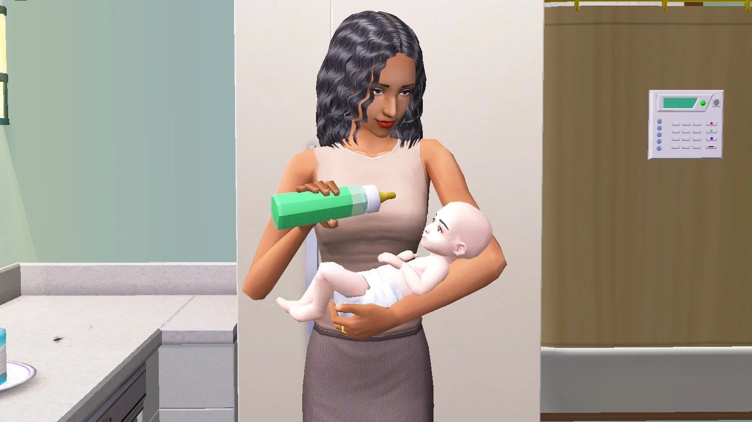 Jennifer Burb feeding the baby